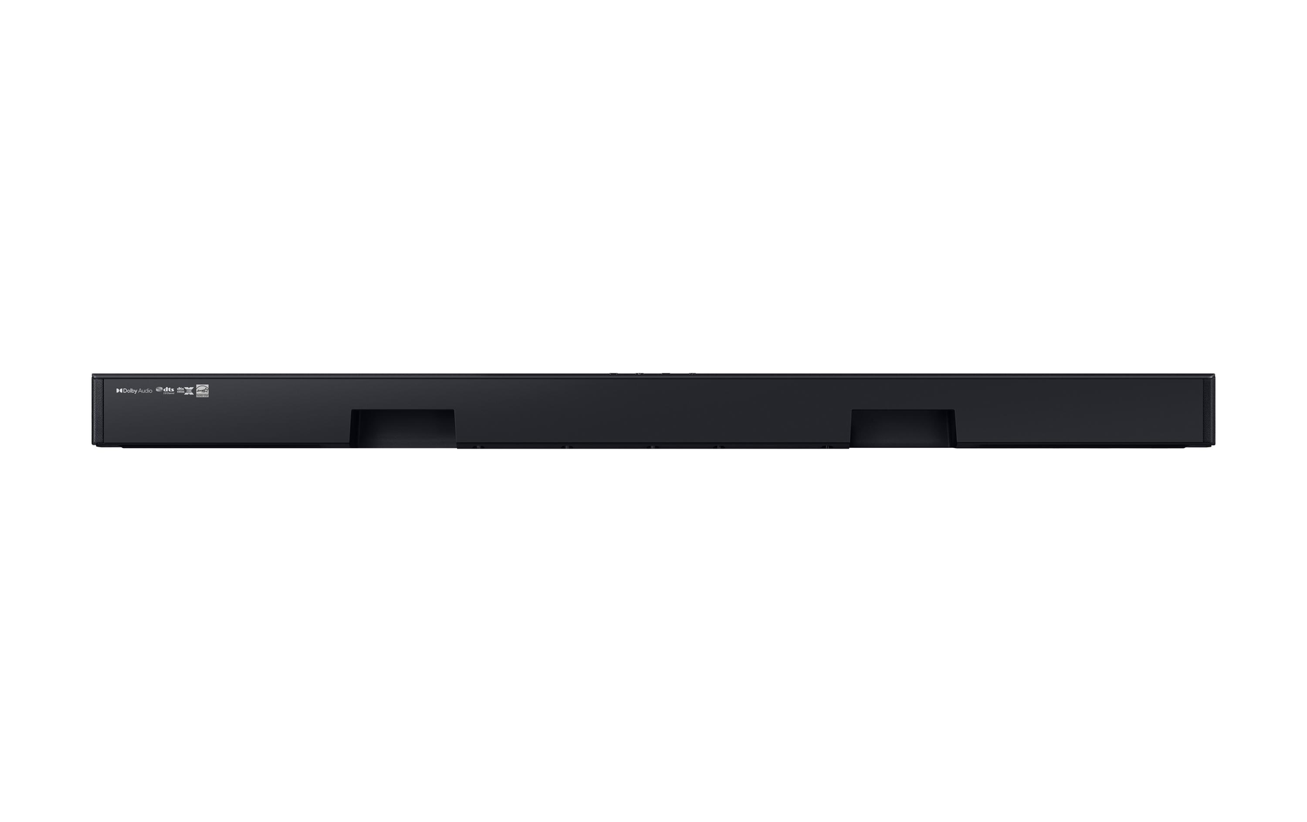 Barra de sonido negra sobre fondo blanco. Tiene aberturas en la parte delantera y el logotipo Dolby Audio a la izquierda.