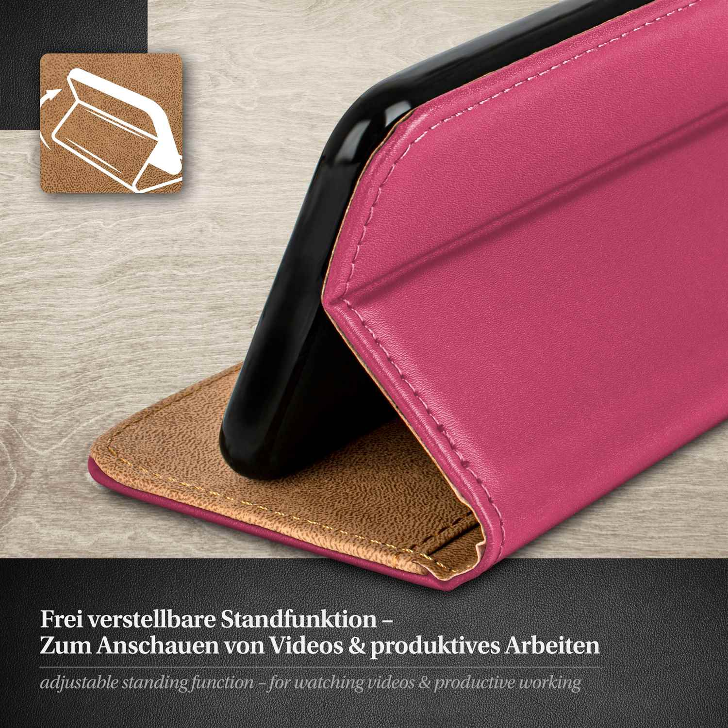 Eine rosa Handyhülle hält ein schwarzes Telefon. Die Hülle ist geöffnet, auf einer Holzoberfläche.