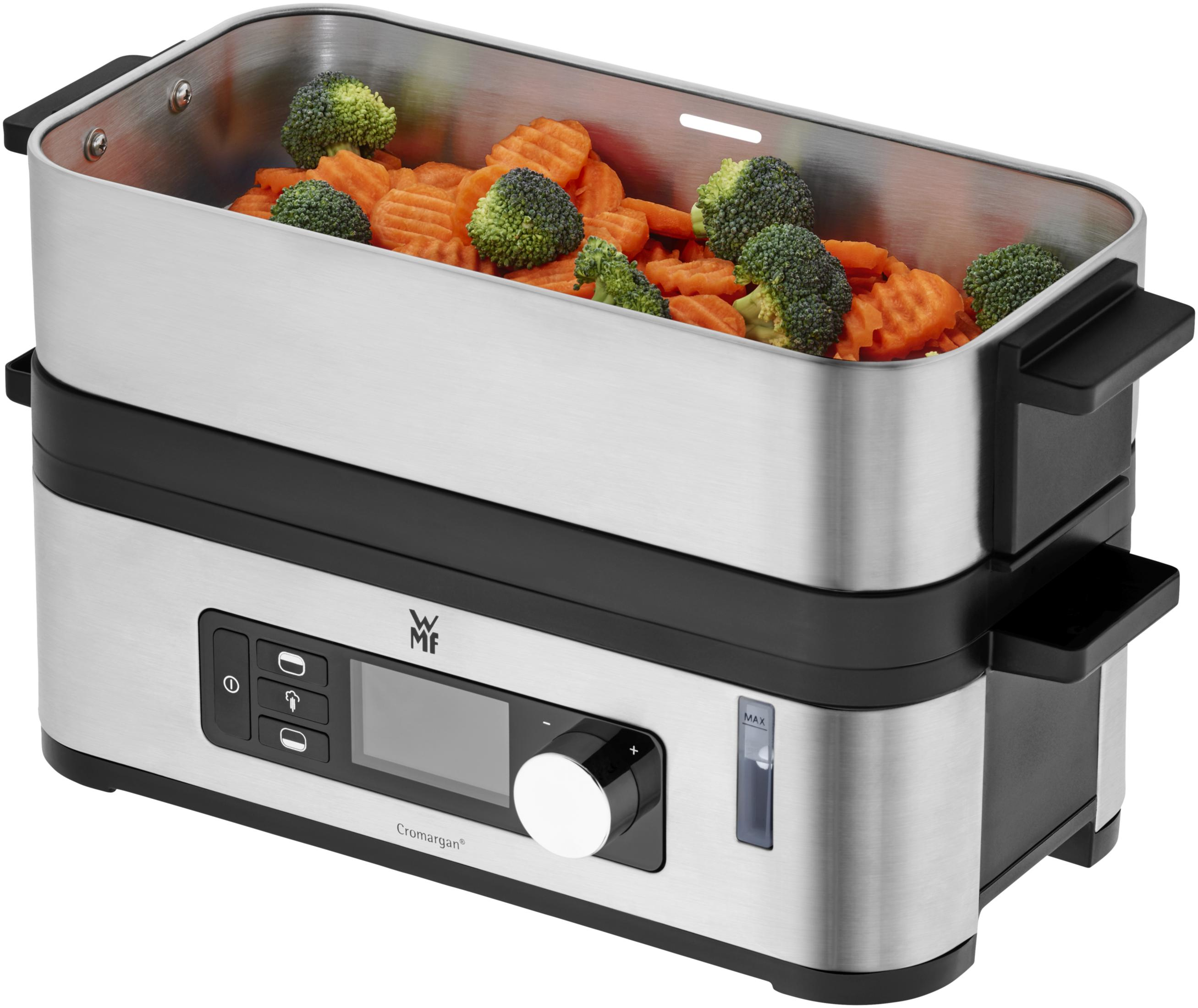 Cuiseur vapeur argenté et noir à deux niveaux avec légumes à l'intérieur, sur fond blanc.