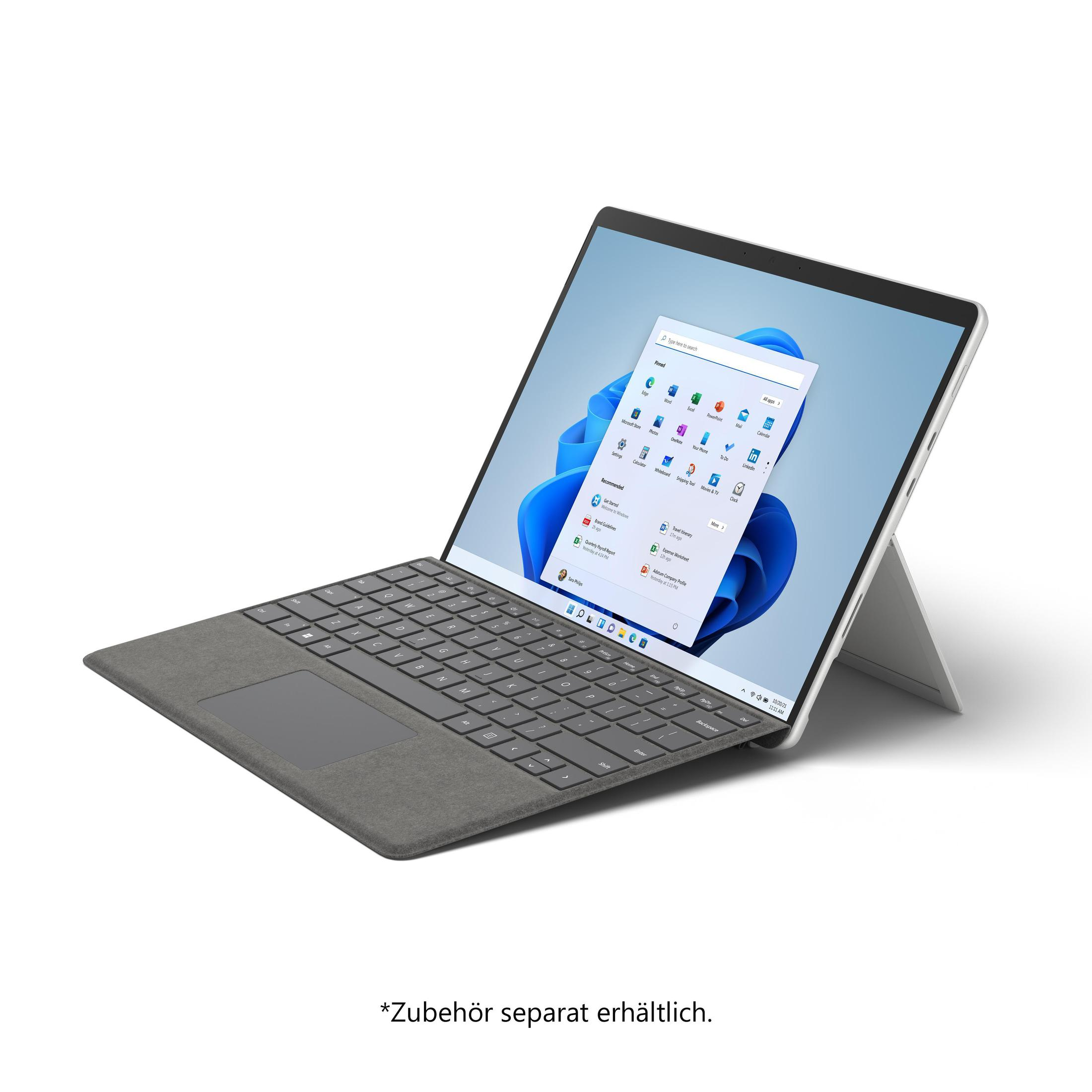 Silberner Laptop mit Tastatur und weißem Bildschirm mit Windows-Oberfläche.