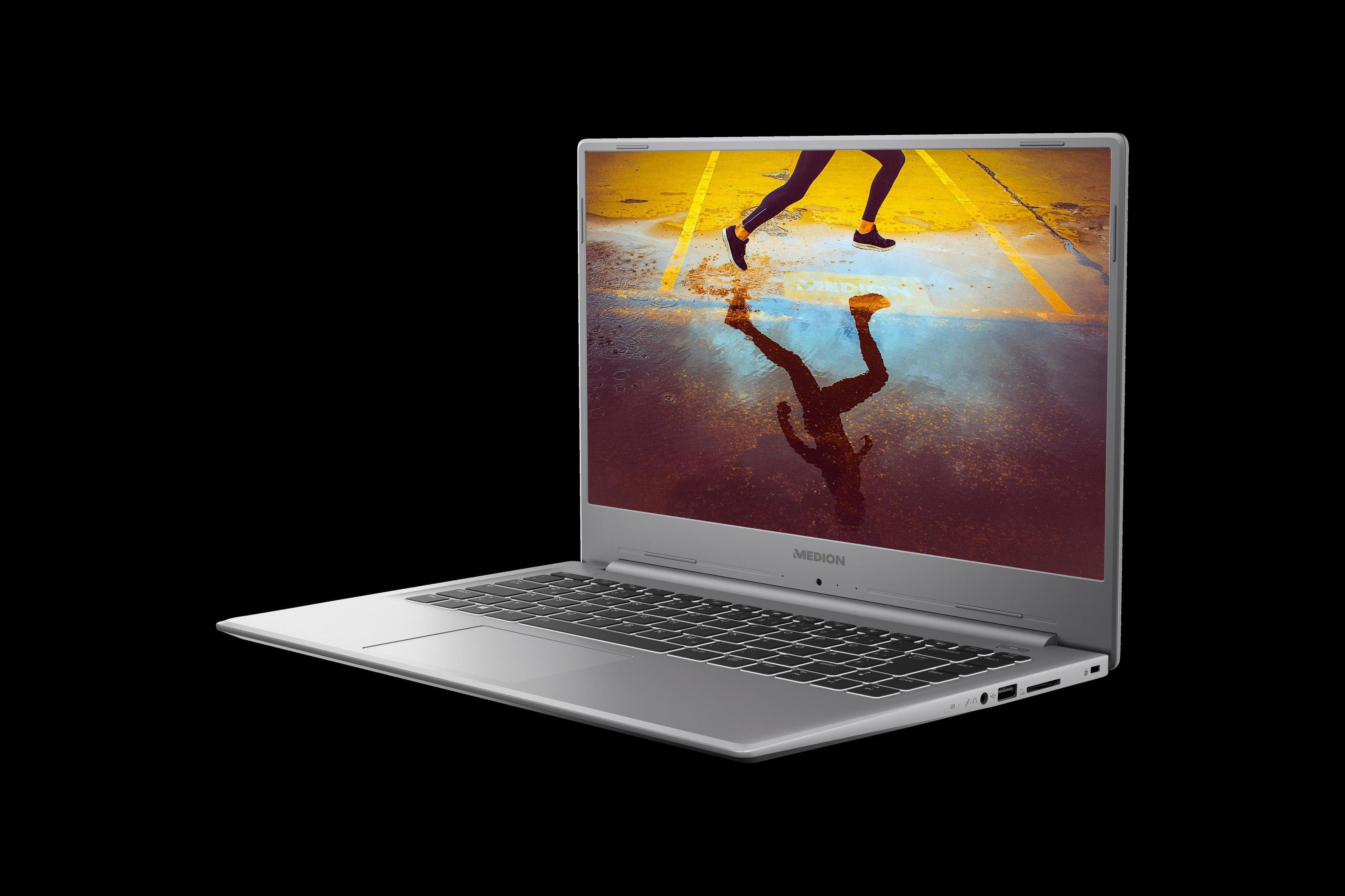 Offener silberner Laptop auf schwarzem Hintergrund, zeigt eine rennende Figur auf dem Bildschirm.