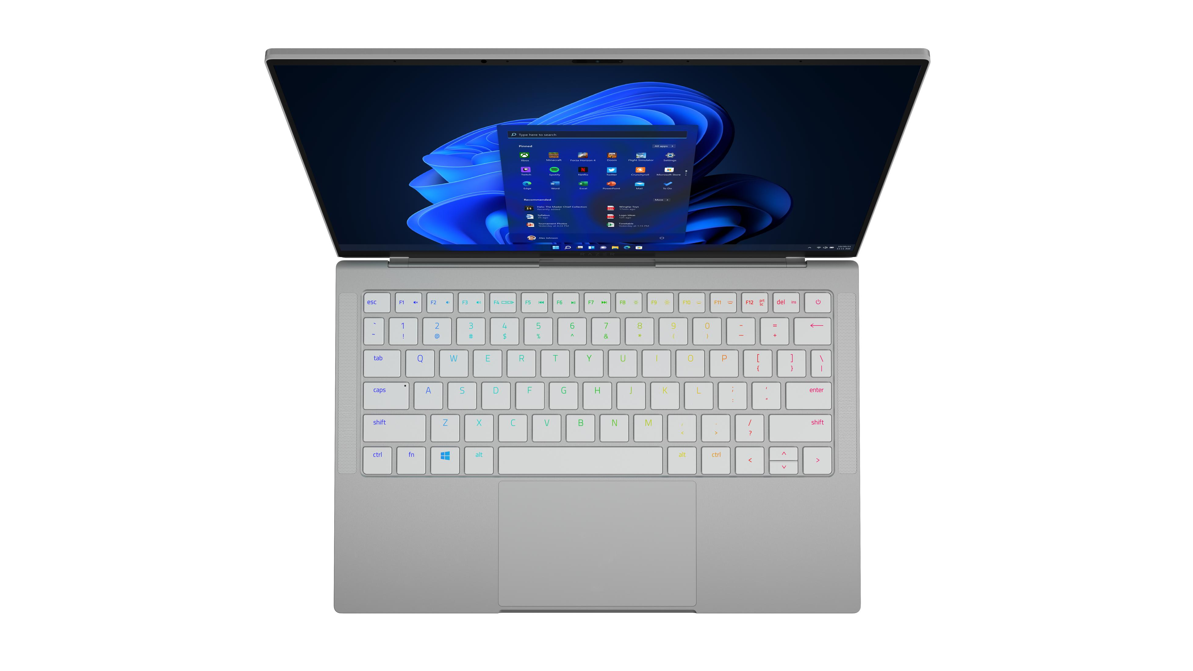 Grauer Laptop geöffnet, zeigt einen Bildschirm mit App-Symbolen und eine mehrfarbige Tastatur.
