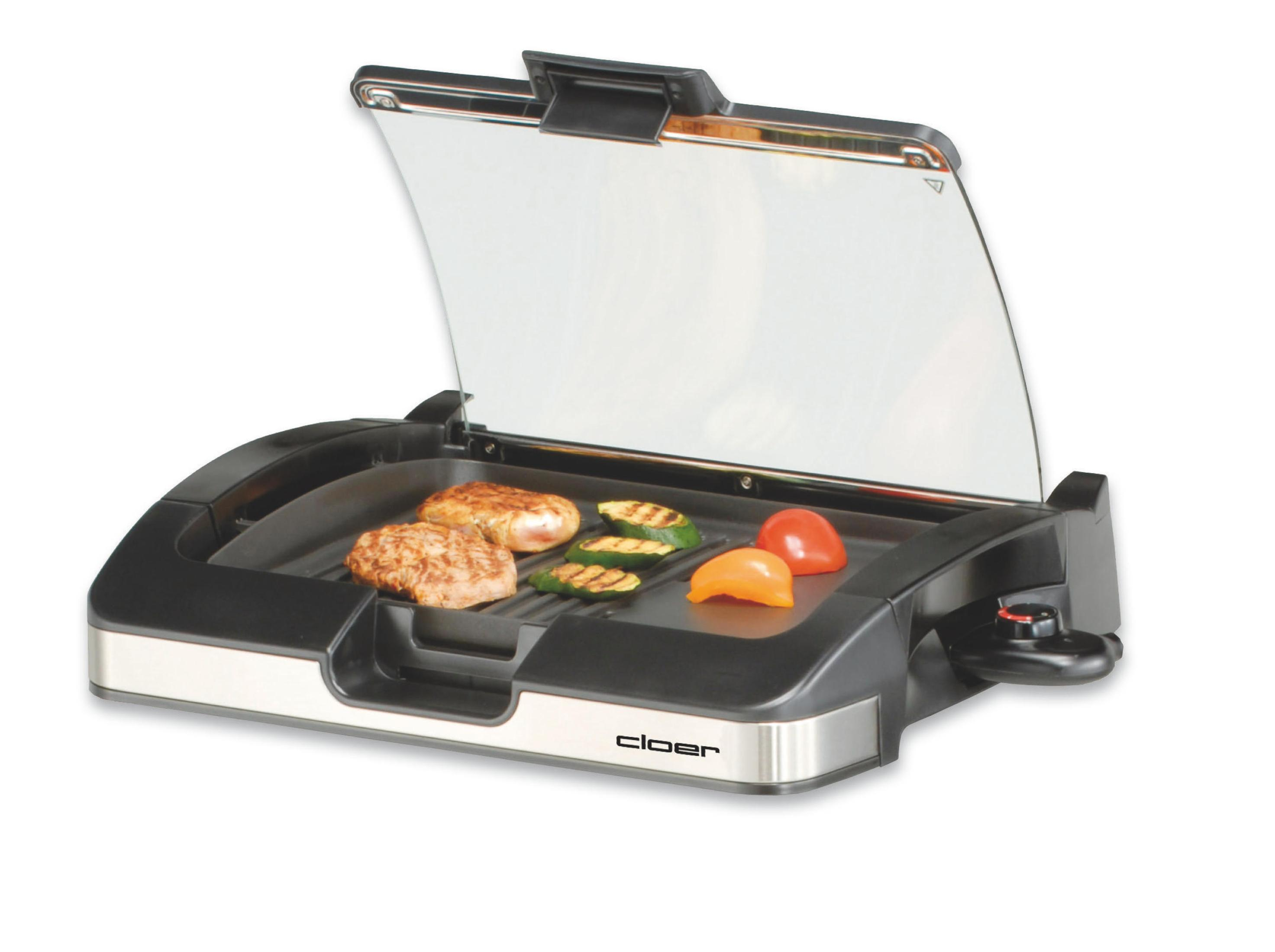 Elektrischer Grill mit Essen, Gemüse, Glasdeckel geöffnet.
