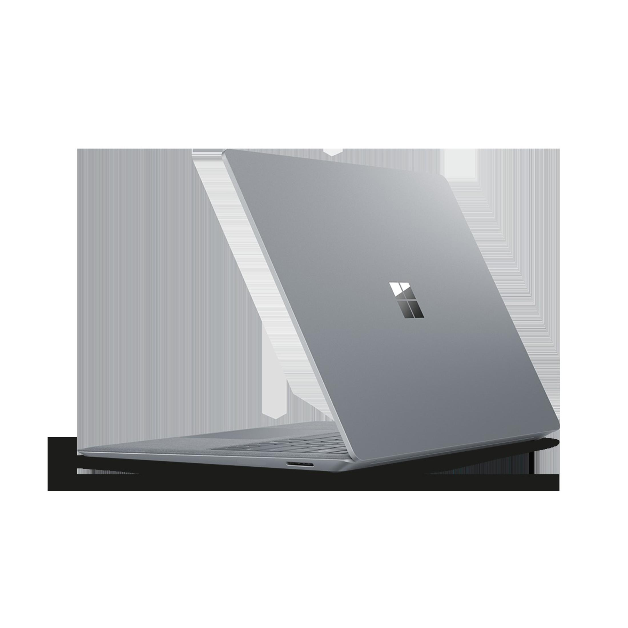 Ein grauer Laptop, geschlossen, mit dem Microsoft-Logo auf der Rückseite, vor grauem Hintergrund.