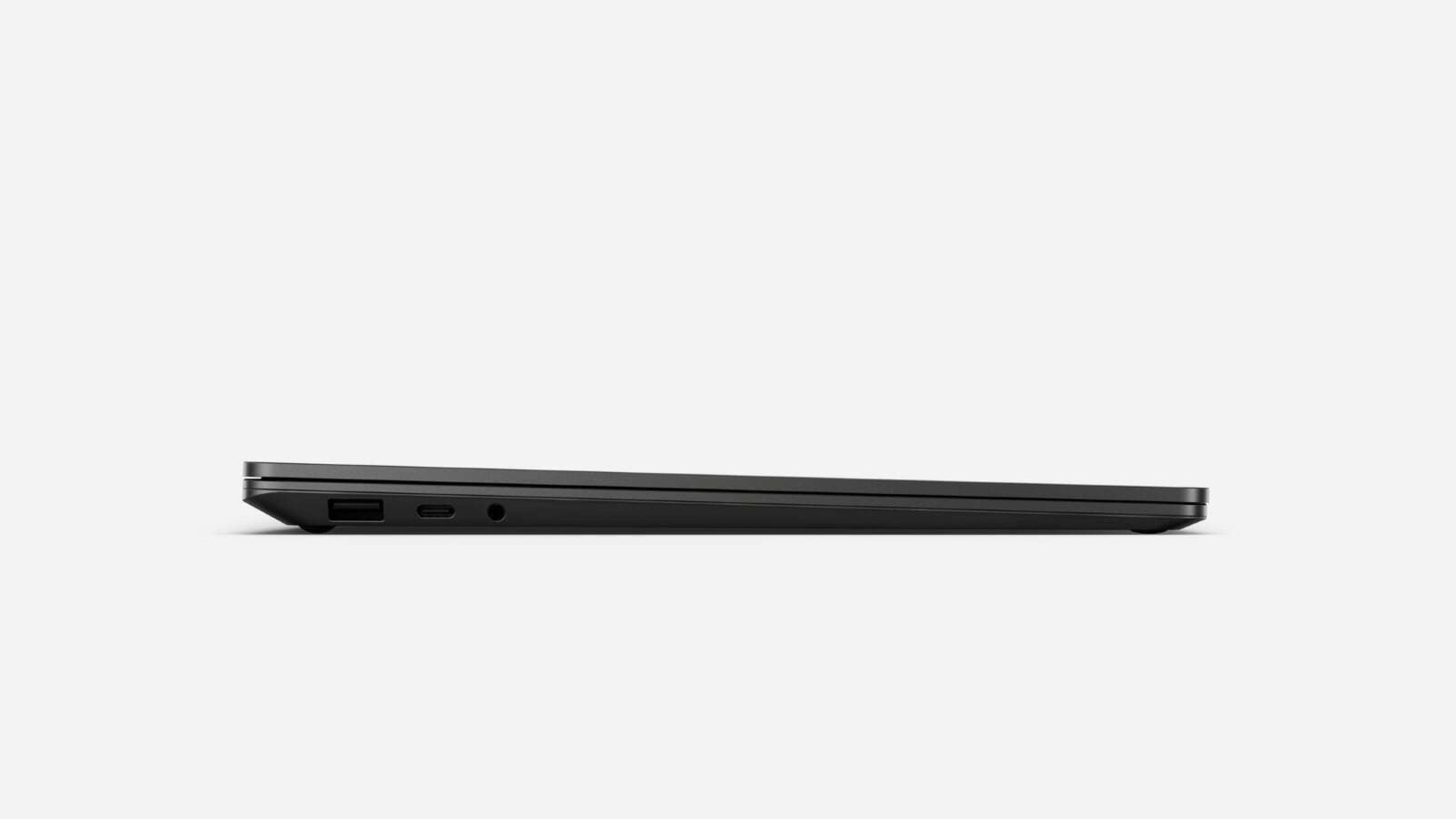 Schwarzes Laptop-Profil, Seitenansicht. Anschlüsse sichtbar. Weißer Hintergrund.
