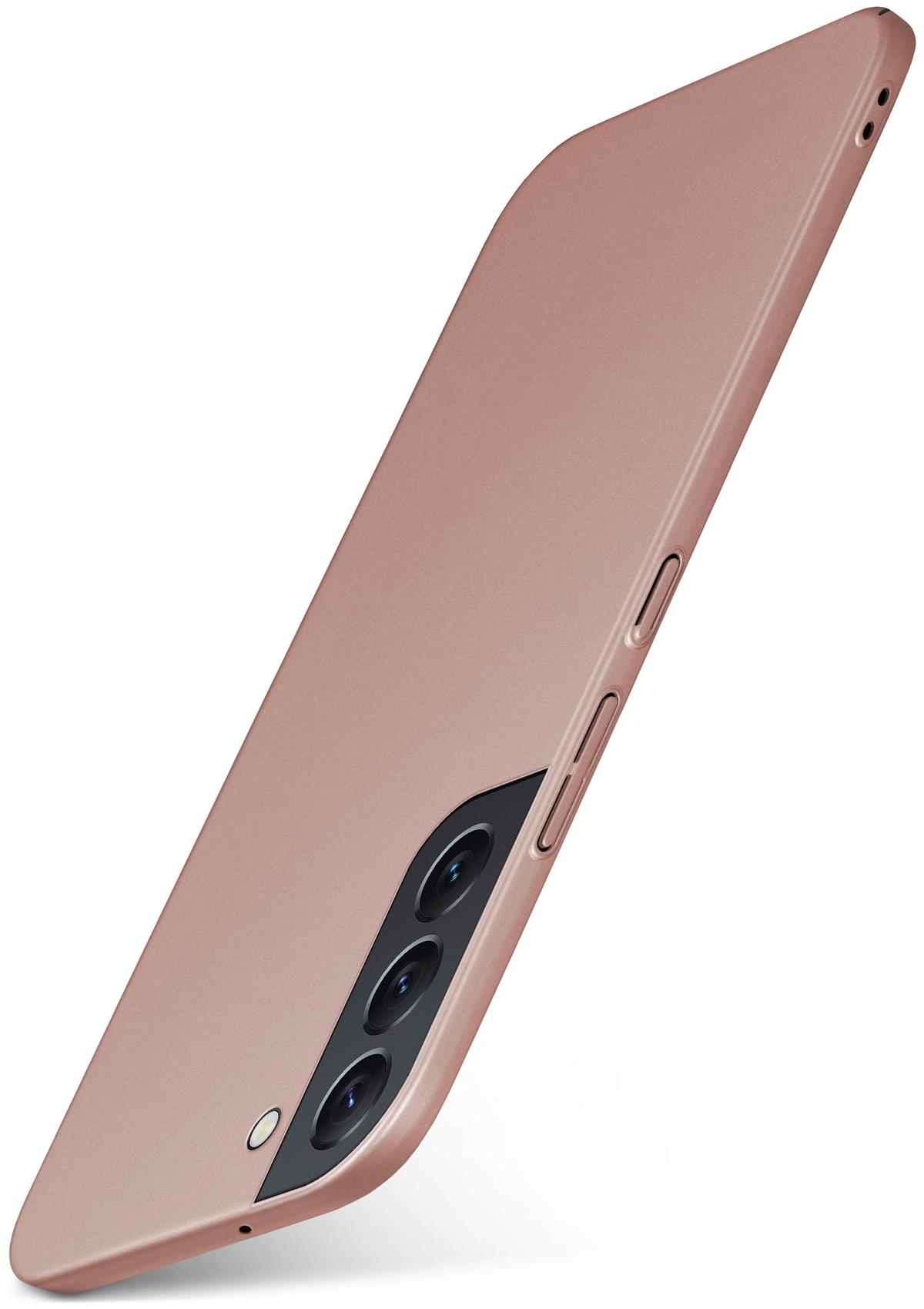 Ein pinkfarbenes Telefon mit Hülle. Das Telefon ist abgewinkelt, die Kameras sind abgewandt.