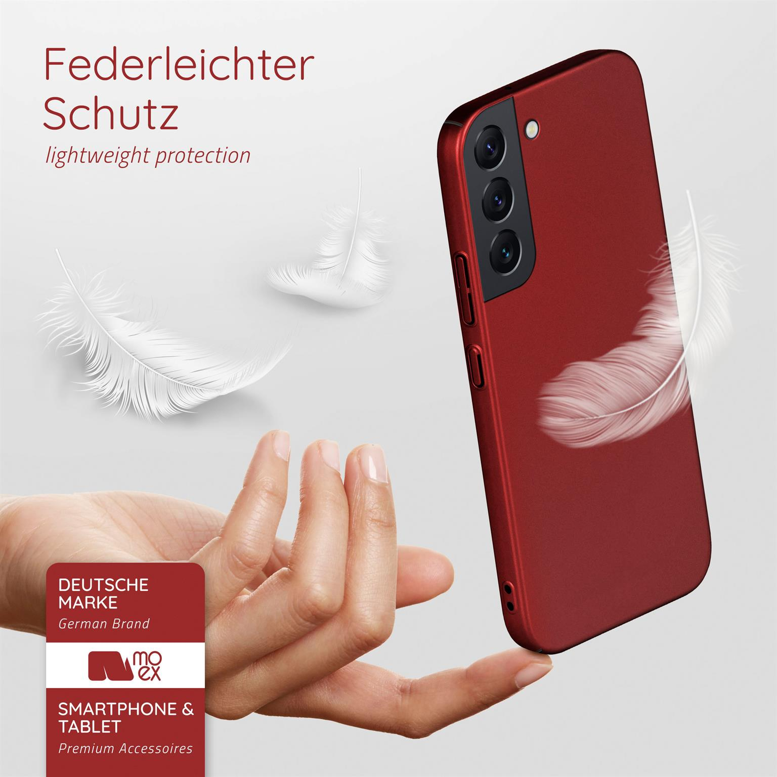 Hand hält eine rote Handyhülle, mit weißen Federn. Text: leichter Schutz.