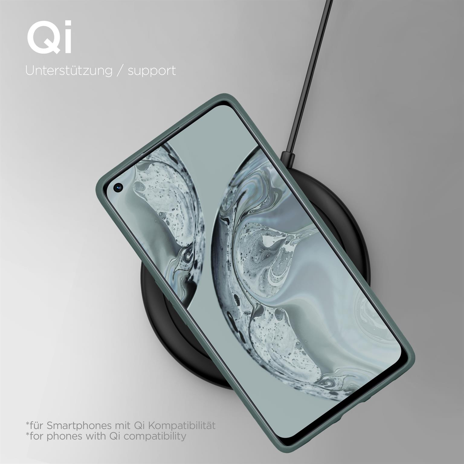 Grünes Telefon im Case auf kabellosem Ladegerät. Text: Qi-Unterstützung. Telefon zeigt abstraktes Bild.