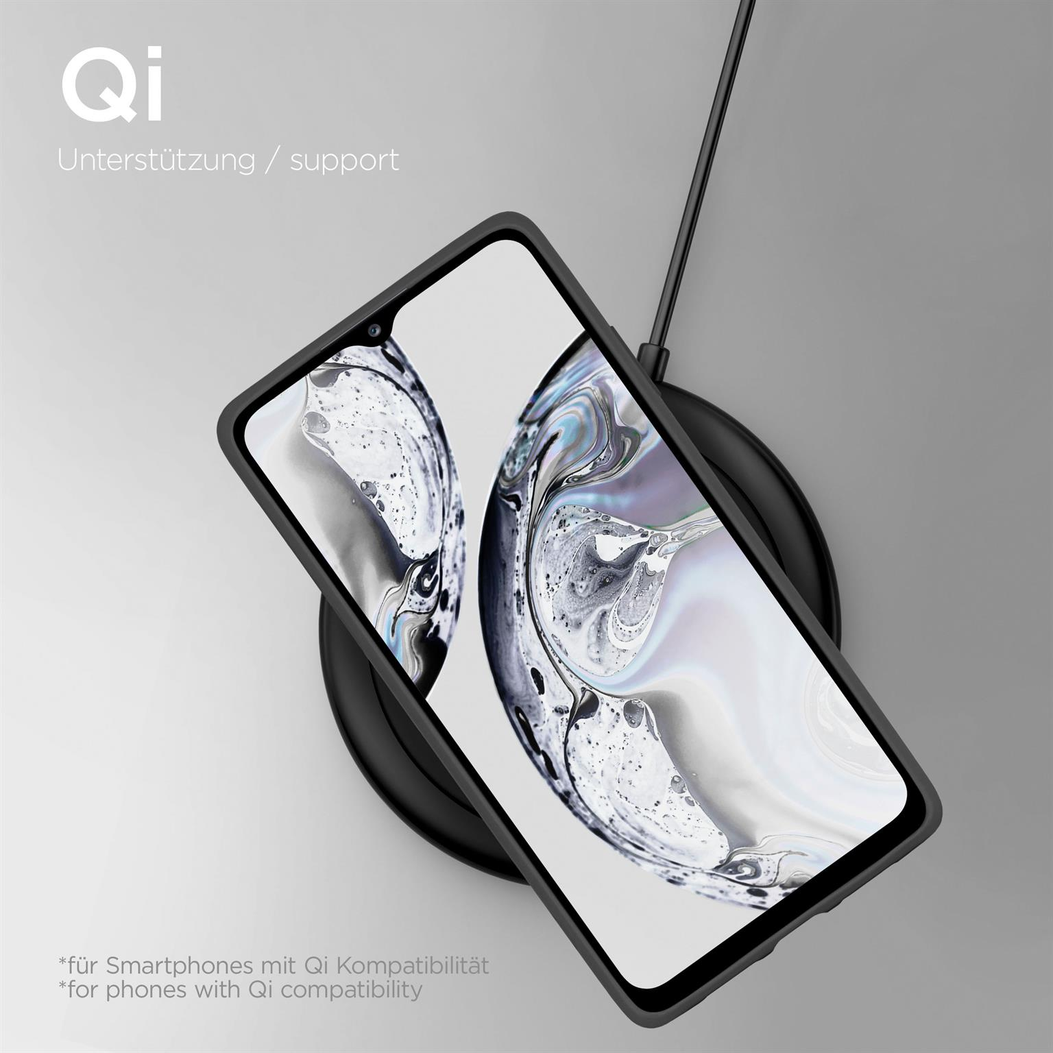 Schwarzes Telefon auf einem schwarzen kabellosen Ladegerät. Der Bildschirm zeigt ein blaues abstraktes Bild.