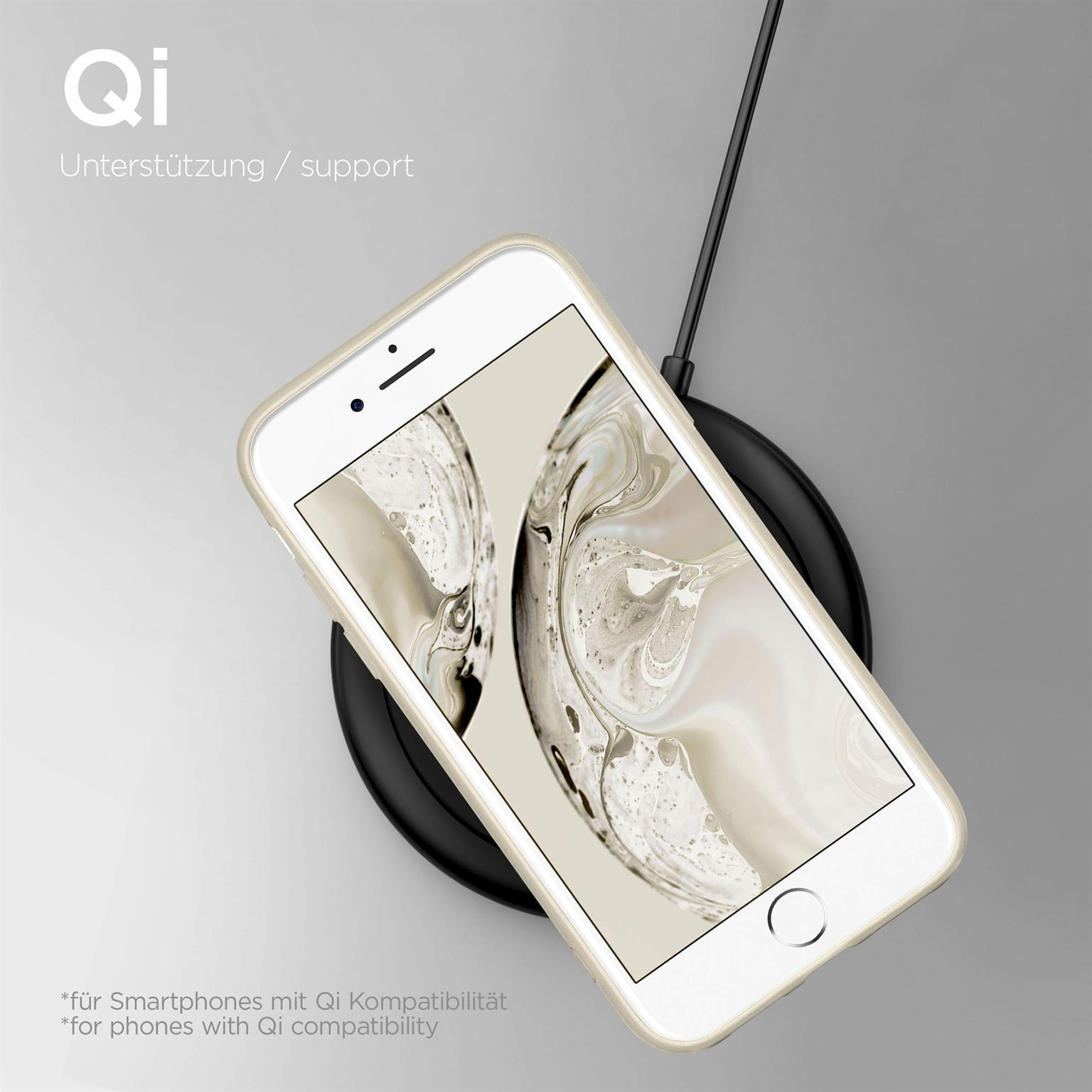 Ein weißes Telefon, das auf einem schwarzen kabellosen Ladegerät geladen wird. Grauer Hintergrund.