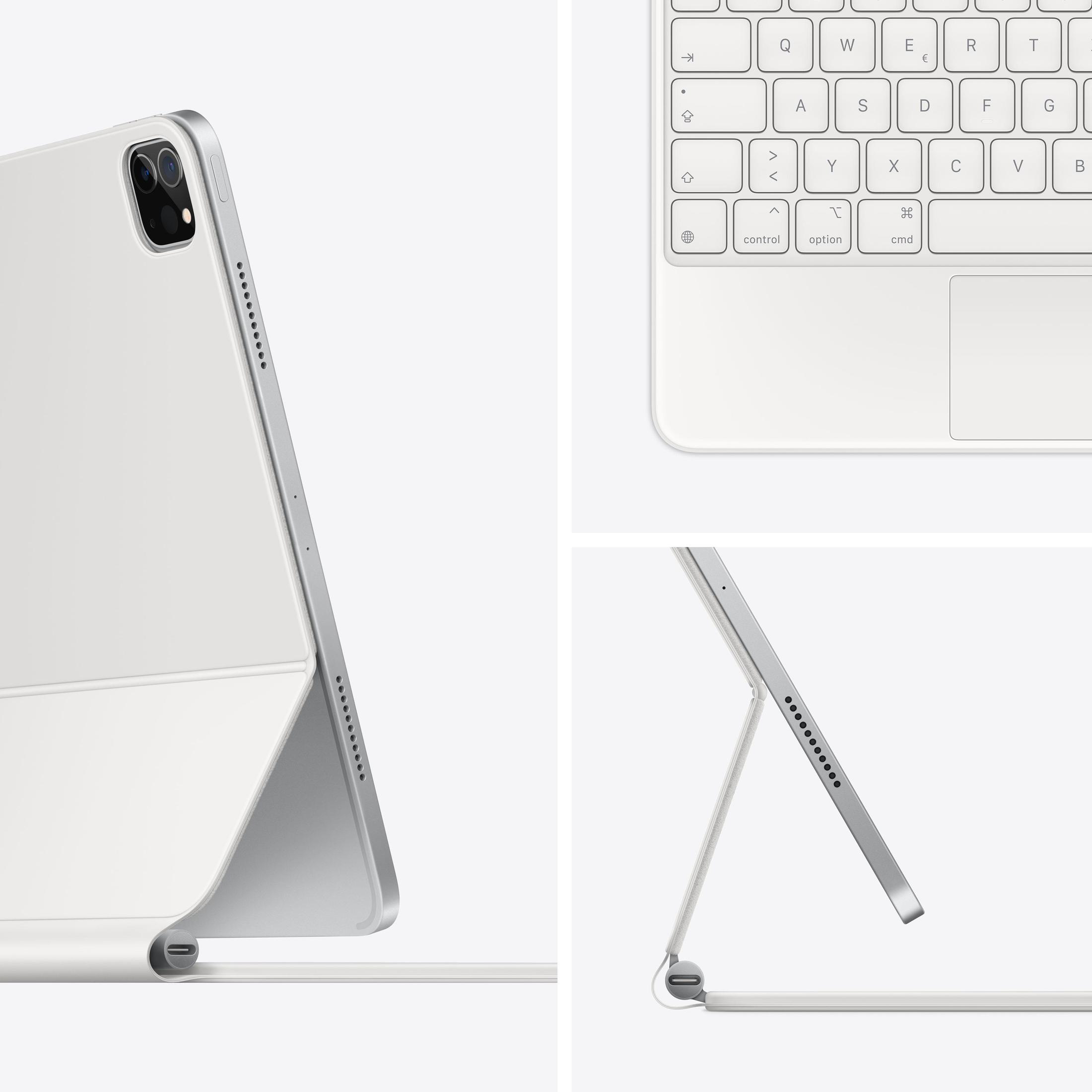 Zbliżenie tabletu i klawiatury. Klawiatura jest biała, a tablet srebrny.