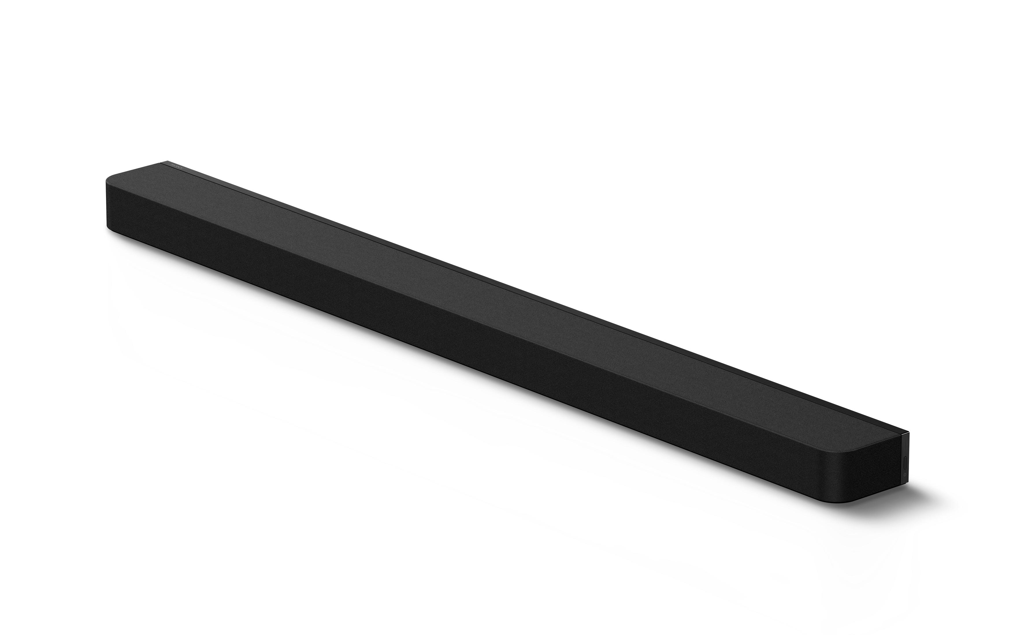 Schwarze Soundbar, ein langer, rechteckiger Lautsprecher, isoliert auf weißem Hintergrund.