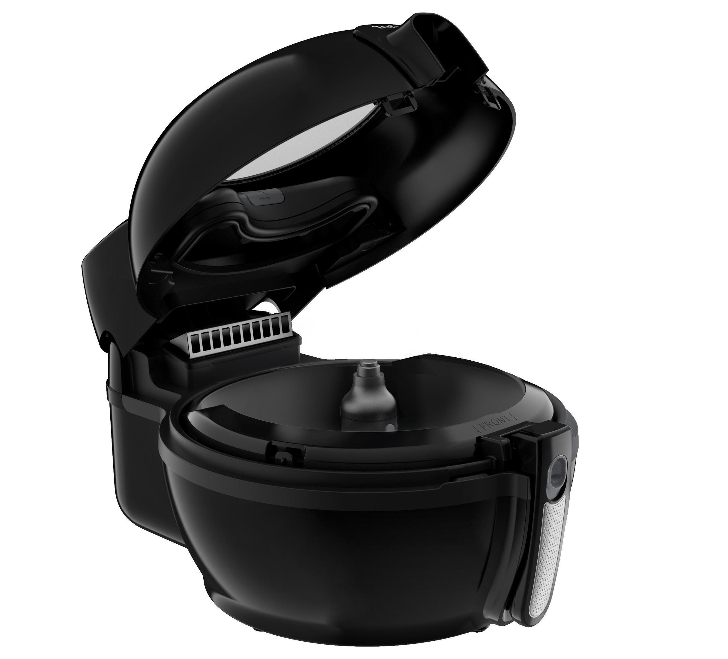 Czarna frytkownica powietrzna otwarta, ukazująca kosz i elementy wewnętrzne. Białe tło.