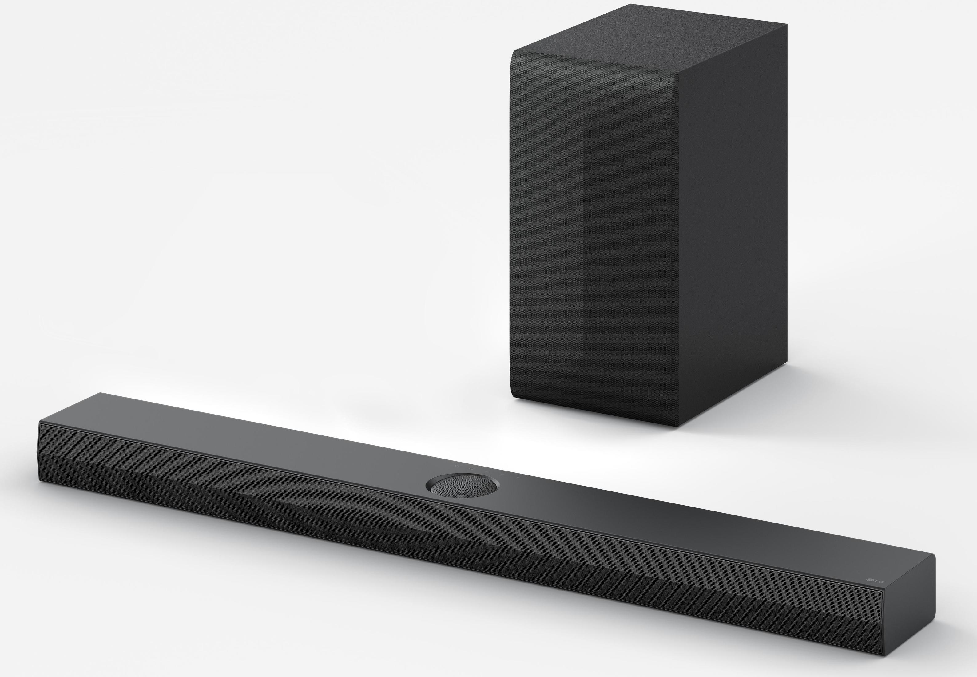 Czarny soundbar i subwoofer na białym tle. Soundbar jest długi, subwoofer to kostka.