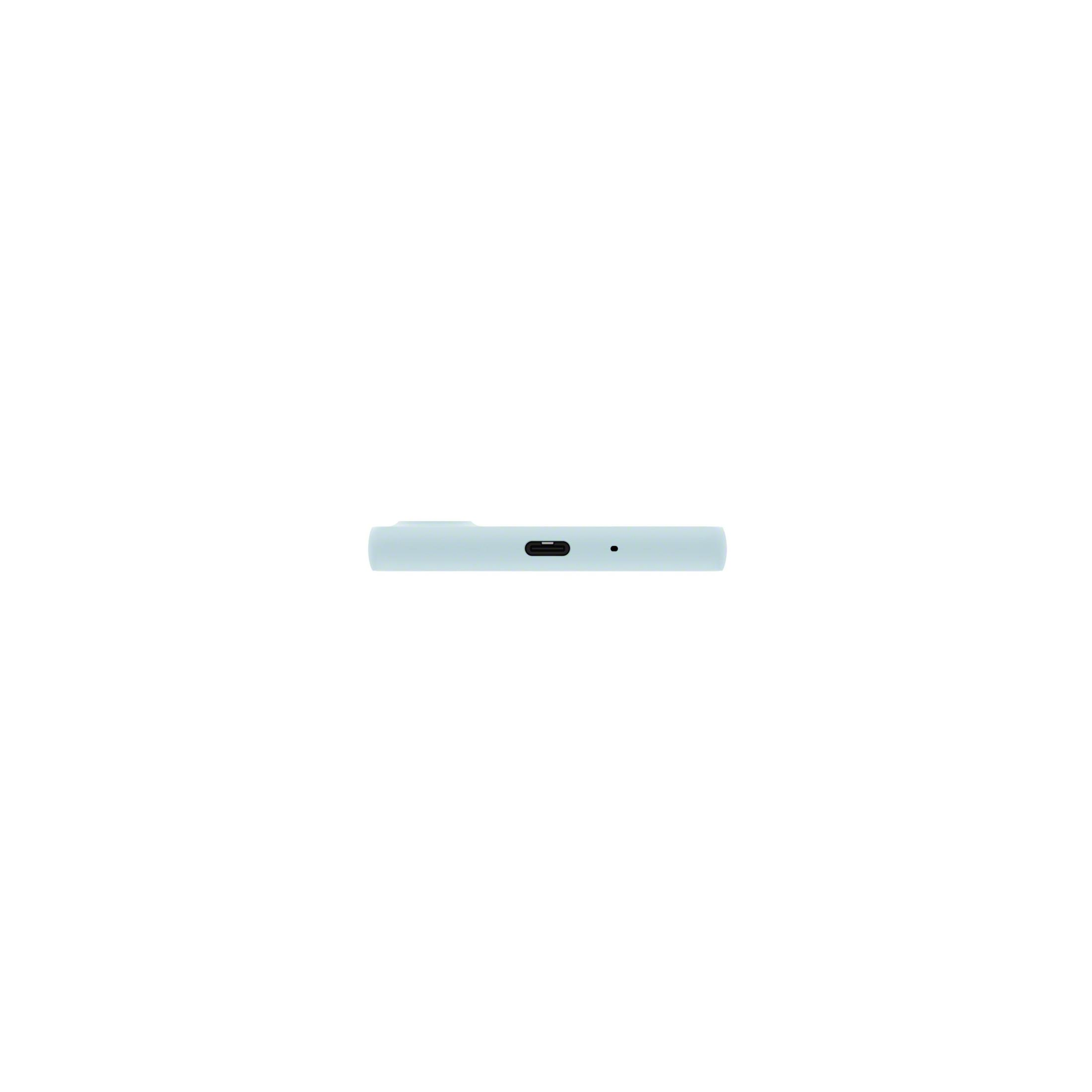 Telefono azzurro. La parte inferiore mostra una porta USB e altre funzioni.