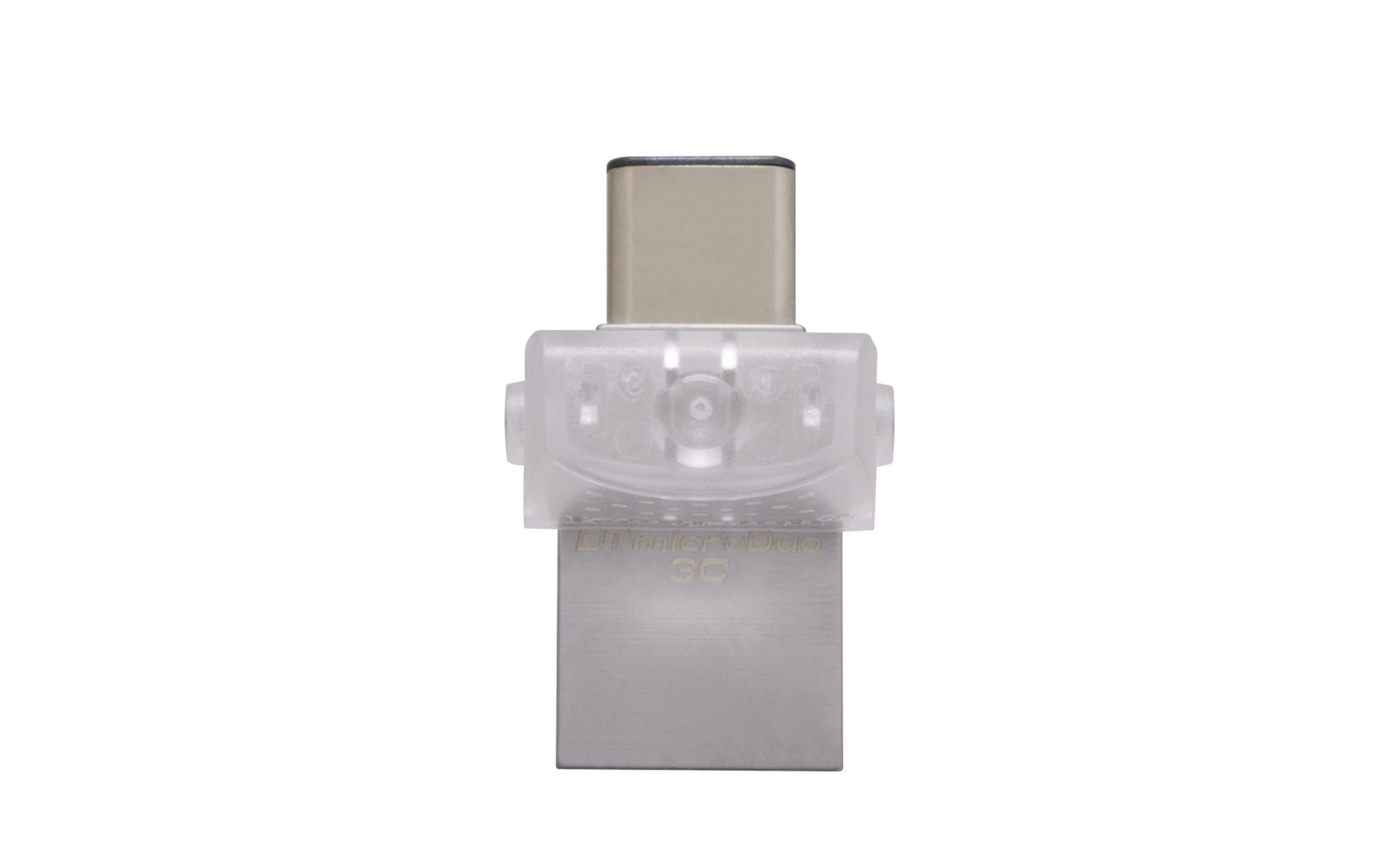 Un adattatore USB-C argento e traslucido. Ha un connettore USB-C e uno slot per schede micro-SD.