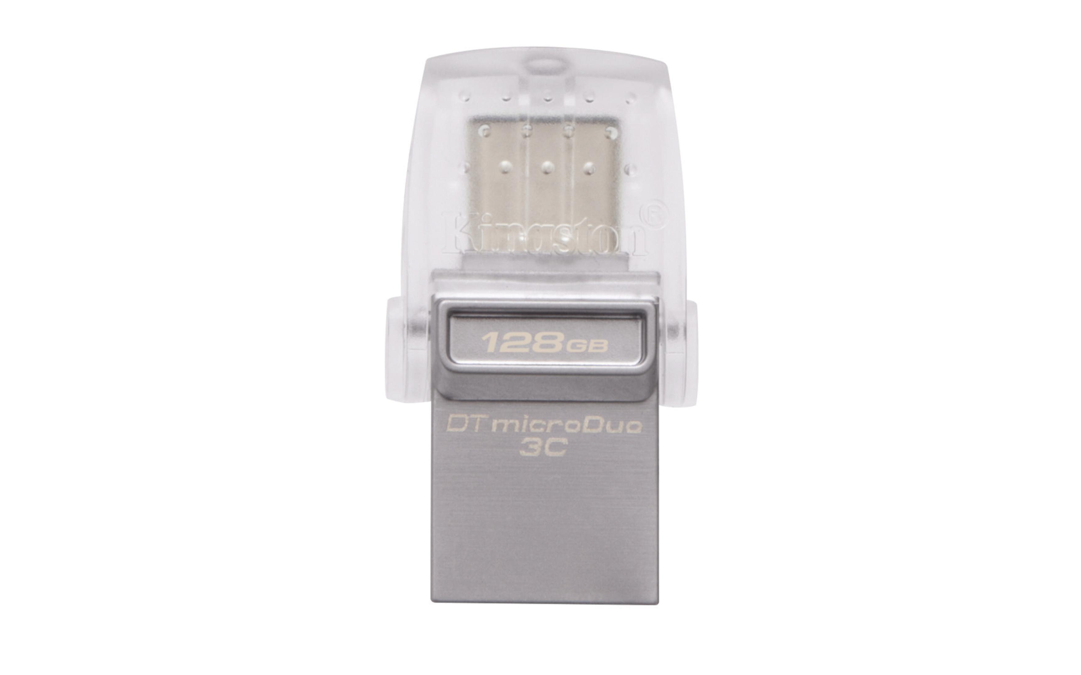 Un'unità USB argentata con un cappuccio di plastica trasparente. L'etichetta indica 128 GB.
