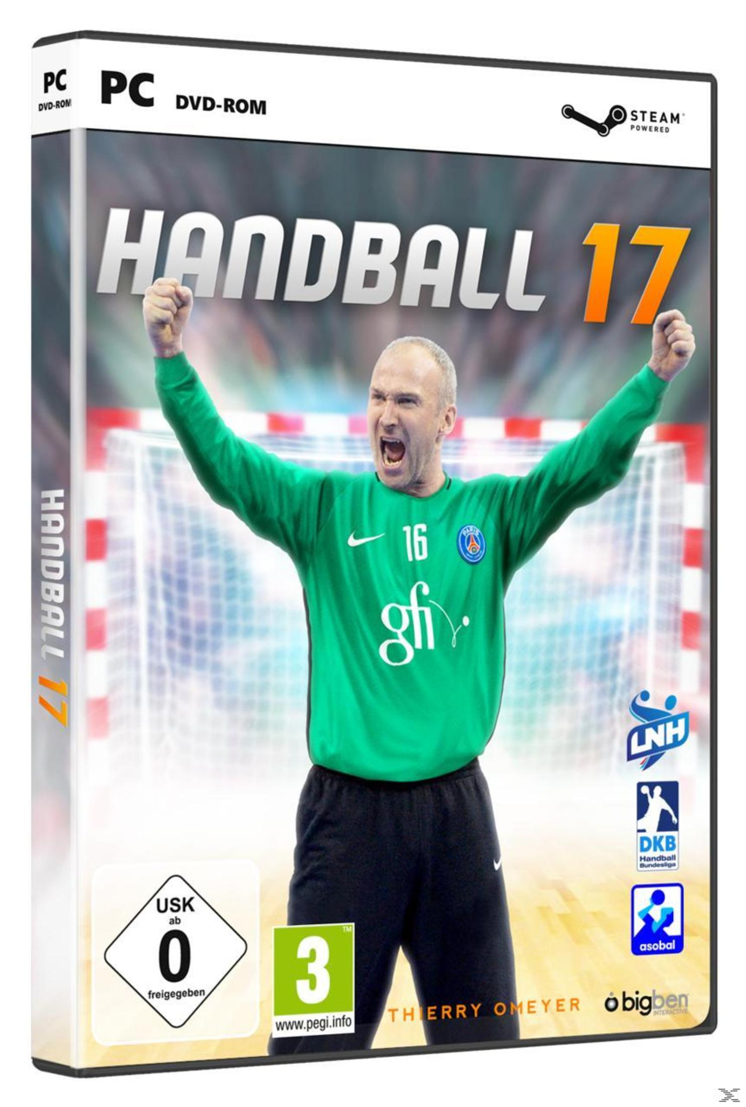 Ein Handballspieler mit erhobenen Armen, grünes Trikot und ein Tor im Hintergrund.