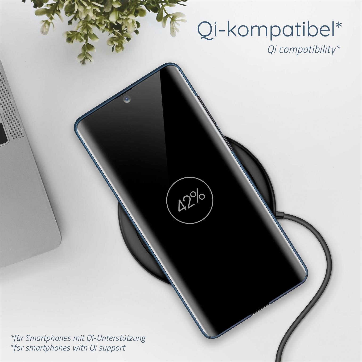 Ein schwarzes Smartphone lädt auf einem kabellosen Ladegerät. Der Bildschirm zeigt 42% Ladung.