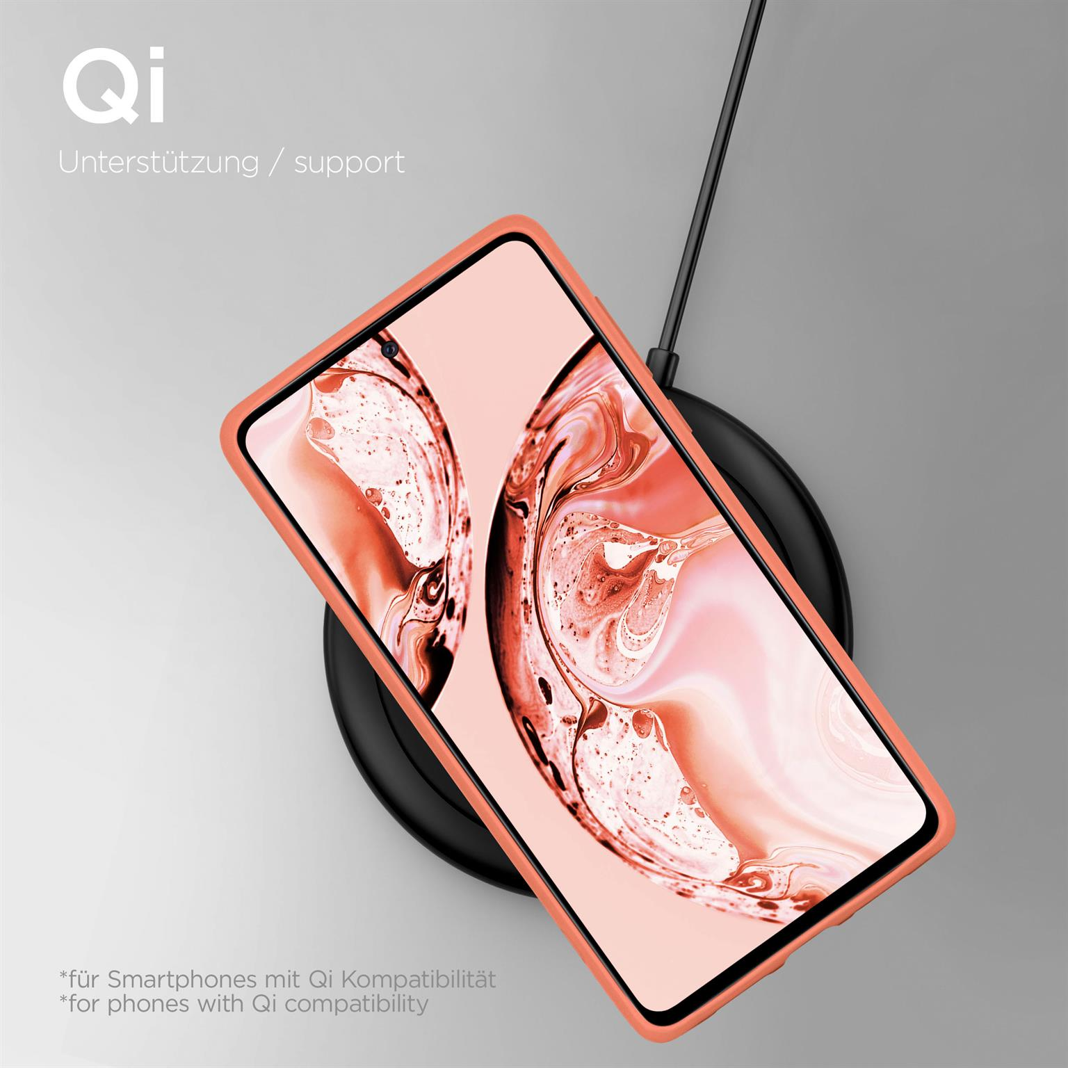 Telefon mit roter Hülle auf kabellosem Ladegerät, Qi.