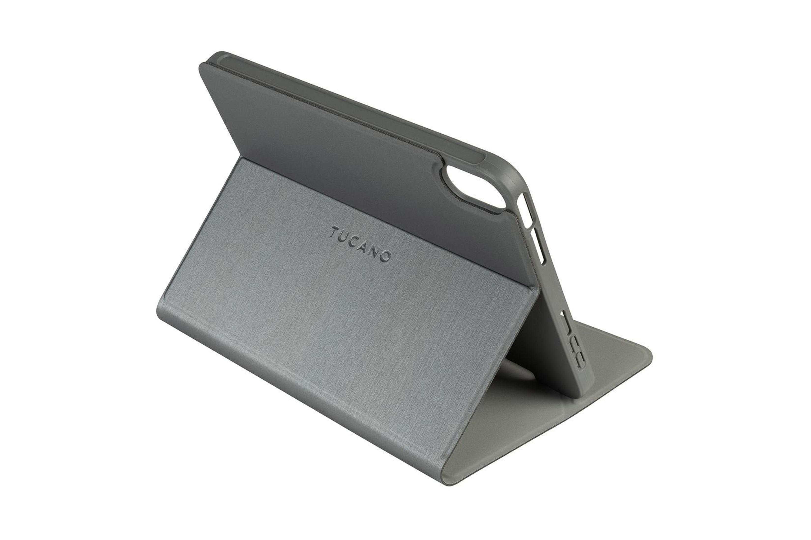 Graue Tablet-Hülle geöffnet, abgewinkelt. Der Markenname 'TUCANO' ist auf der Vorderseite sichtbar.