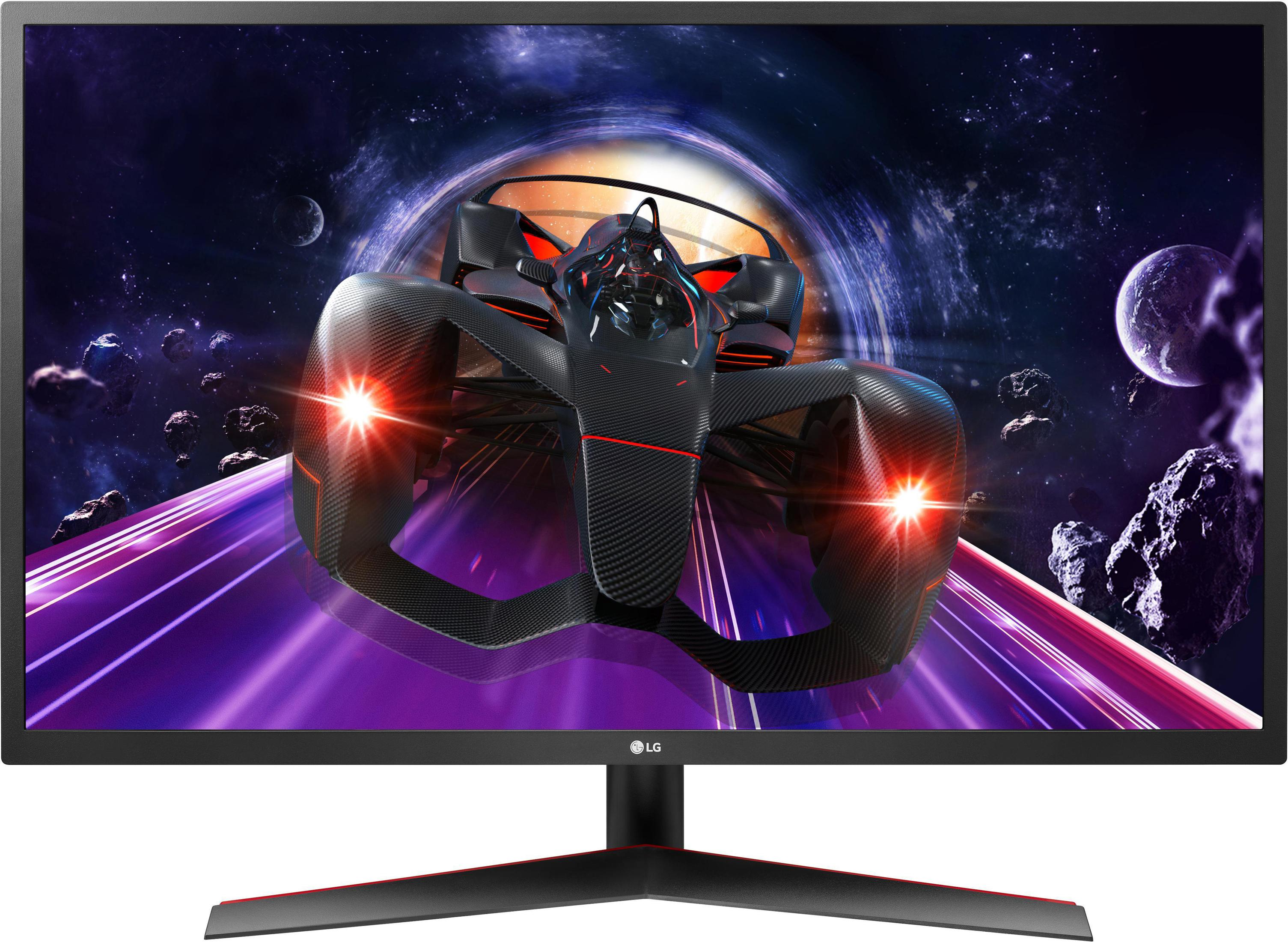 Un monitor LG mostra una scena di un gioco di corse. Un'auto da corsa rossa e nera sfreccia su una pista neon.