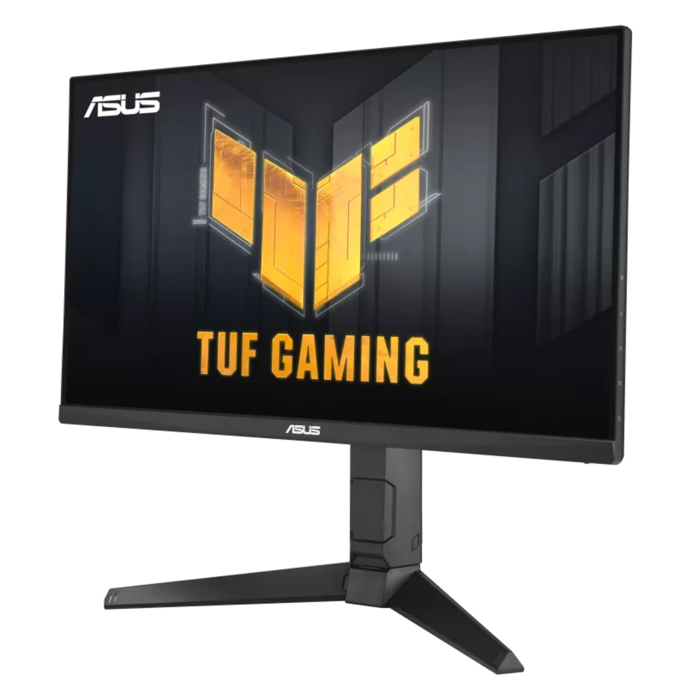 ASUS TUF Gaming monitor on a black stand. The screen displays a yellow and black logo.