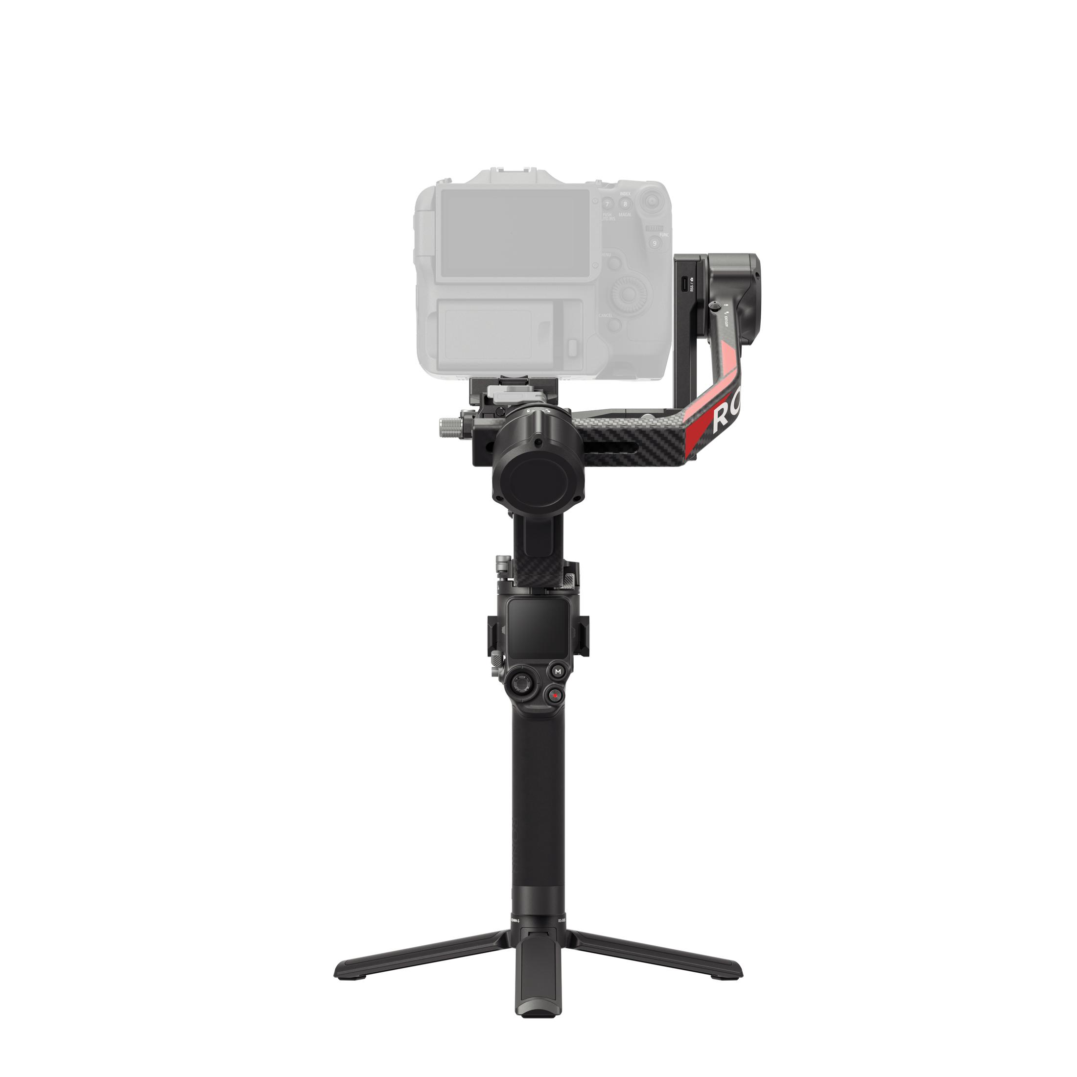 Een camera gimbal met een gemonteerde camera, zwart en rood, op een statief.