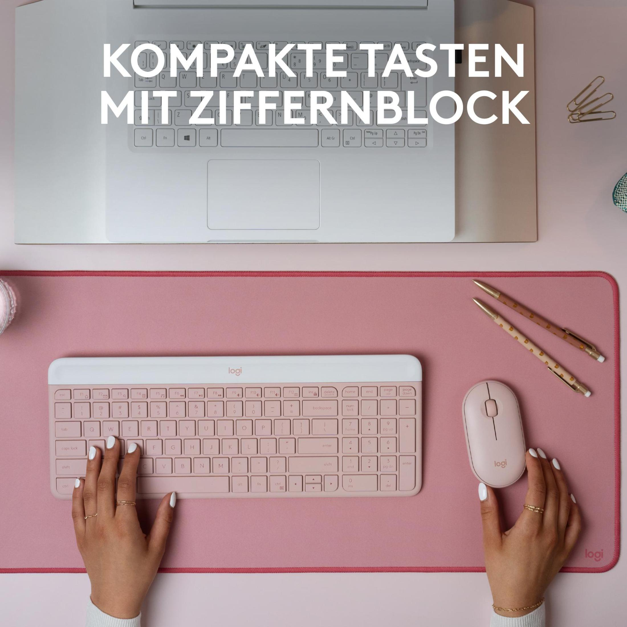 Zestaw z laptopem, klawiaturą, myszą i podkładką. Klawiatura i mysz są jasnoróżowe.