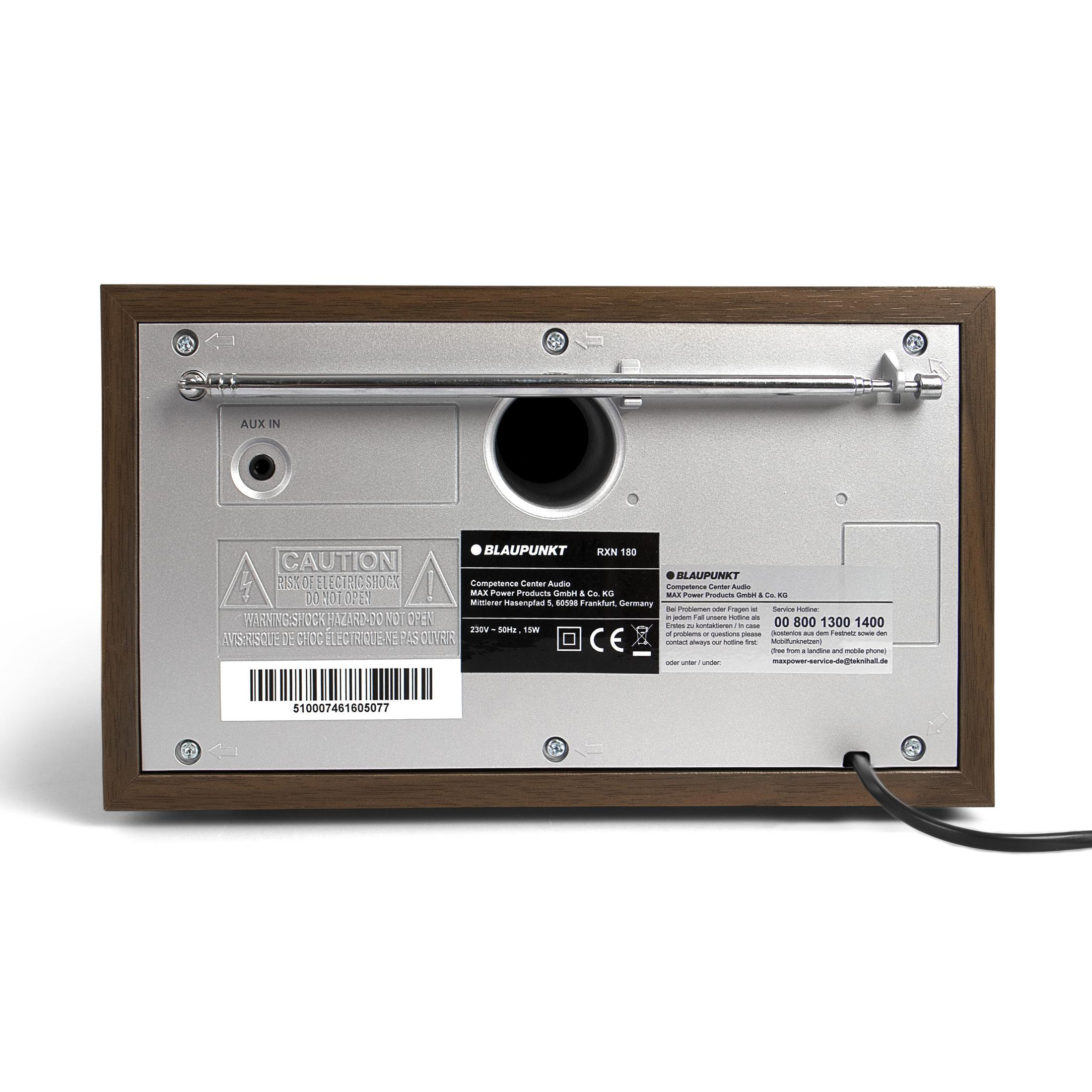 Il retro di una radio Blaupunkt RXN 180, che mostra porte, avvertenze di sicurezza e dettagli di certificazione.