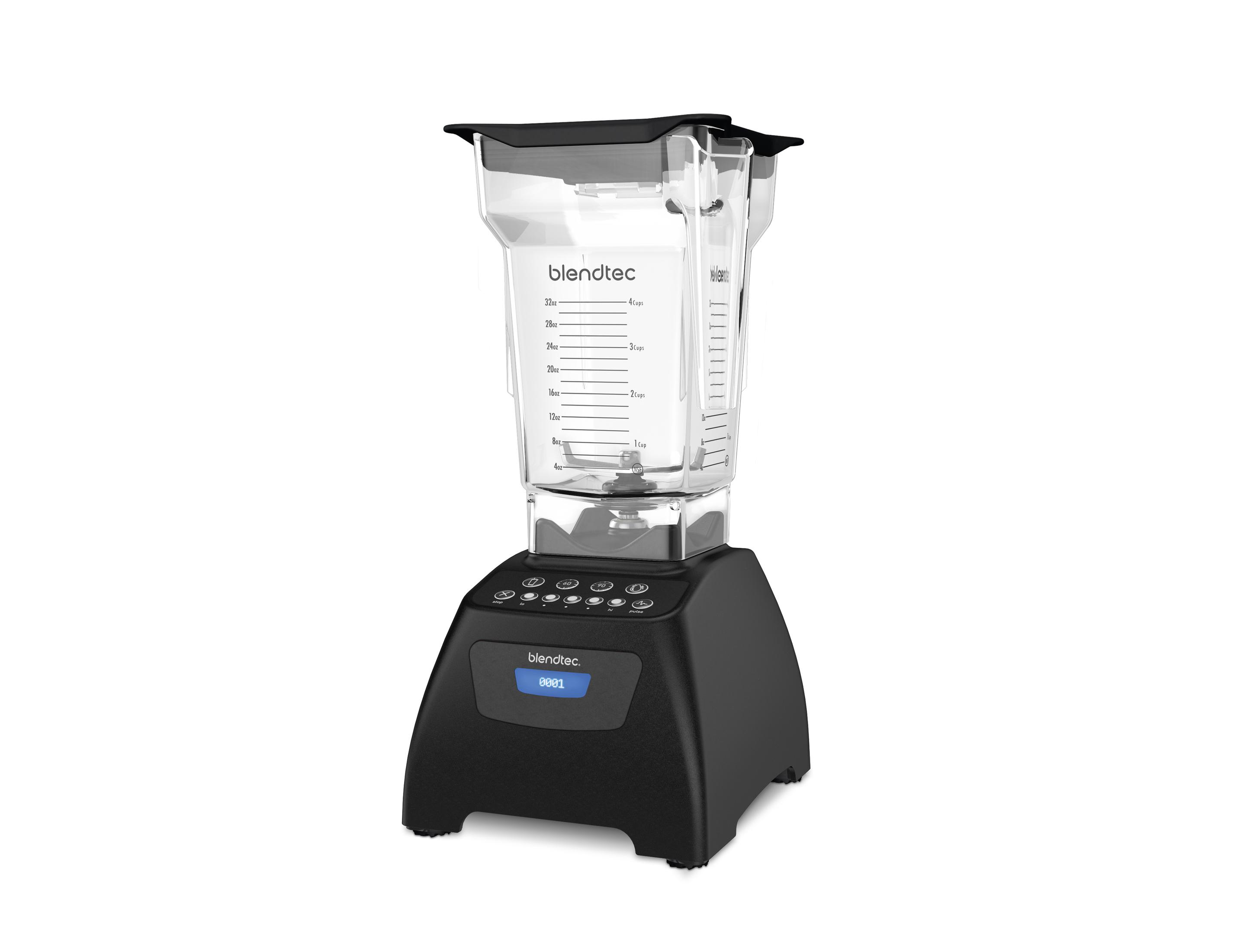 Şeffaf bir kap ile siyah bir Blendtec blender. Tabanında düğmeler var. Beyaz arka plan.