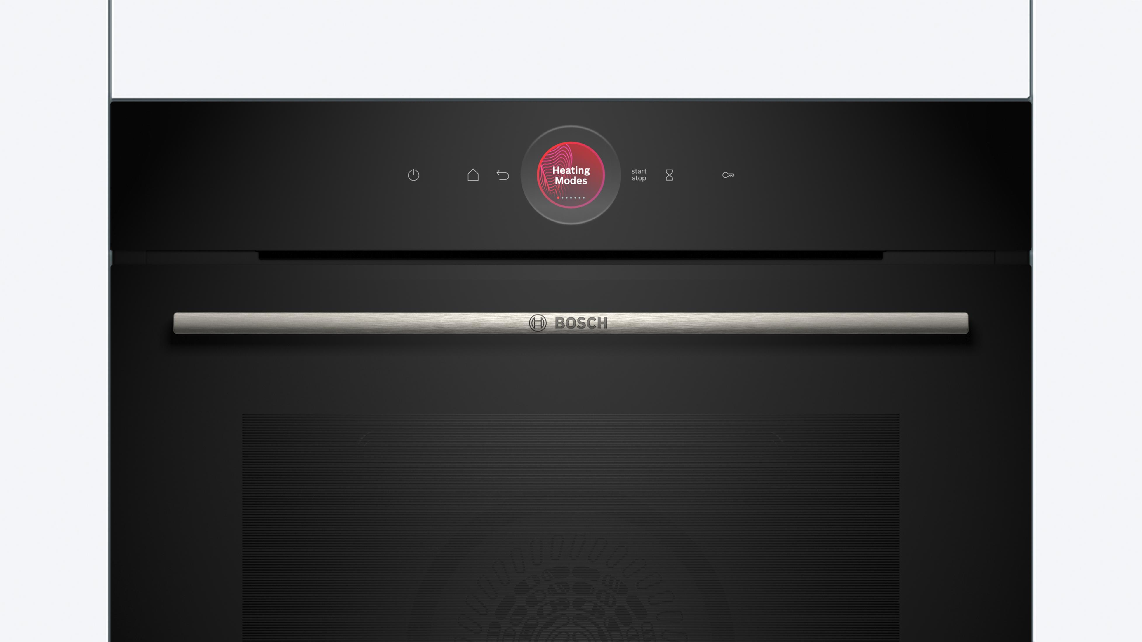 Czarny piekarnik Bosch z wyświetlaczem. Piekarnik jest wyłączony, z metalowym uchwytem.