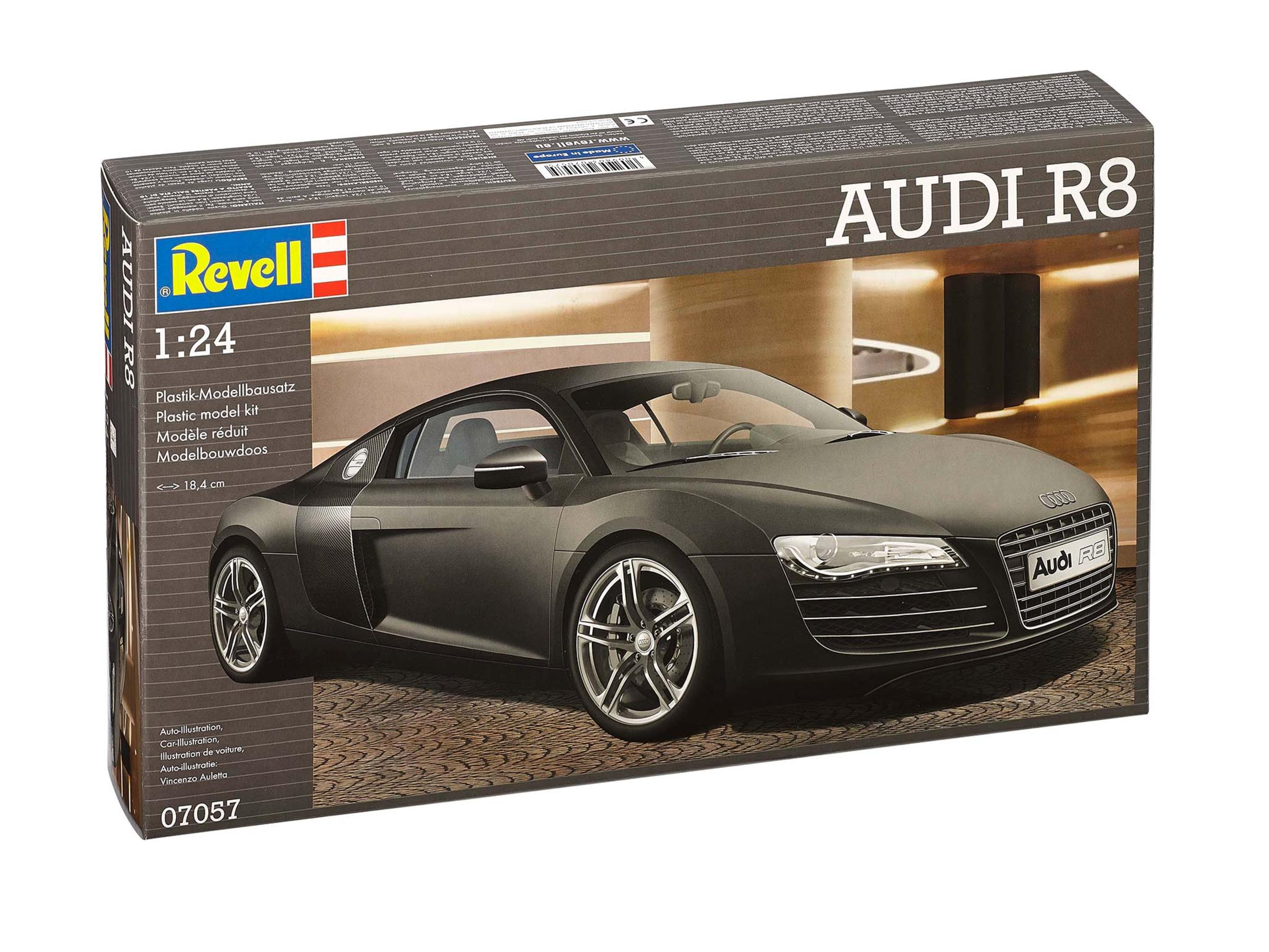 Grafika na pudełku modelu samochodu Audi R8. Samochód jest czarny, umieszczony na pudełku z logo marki.