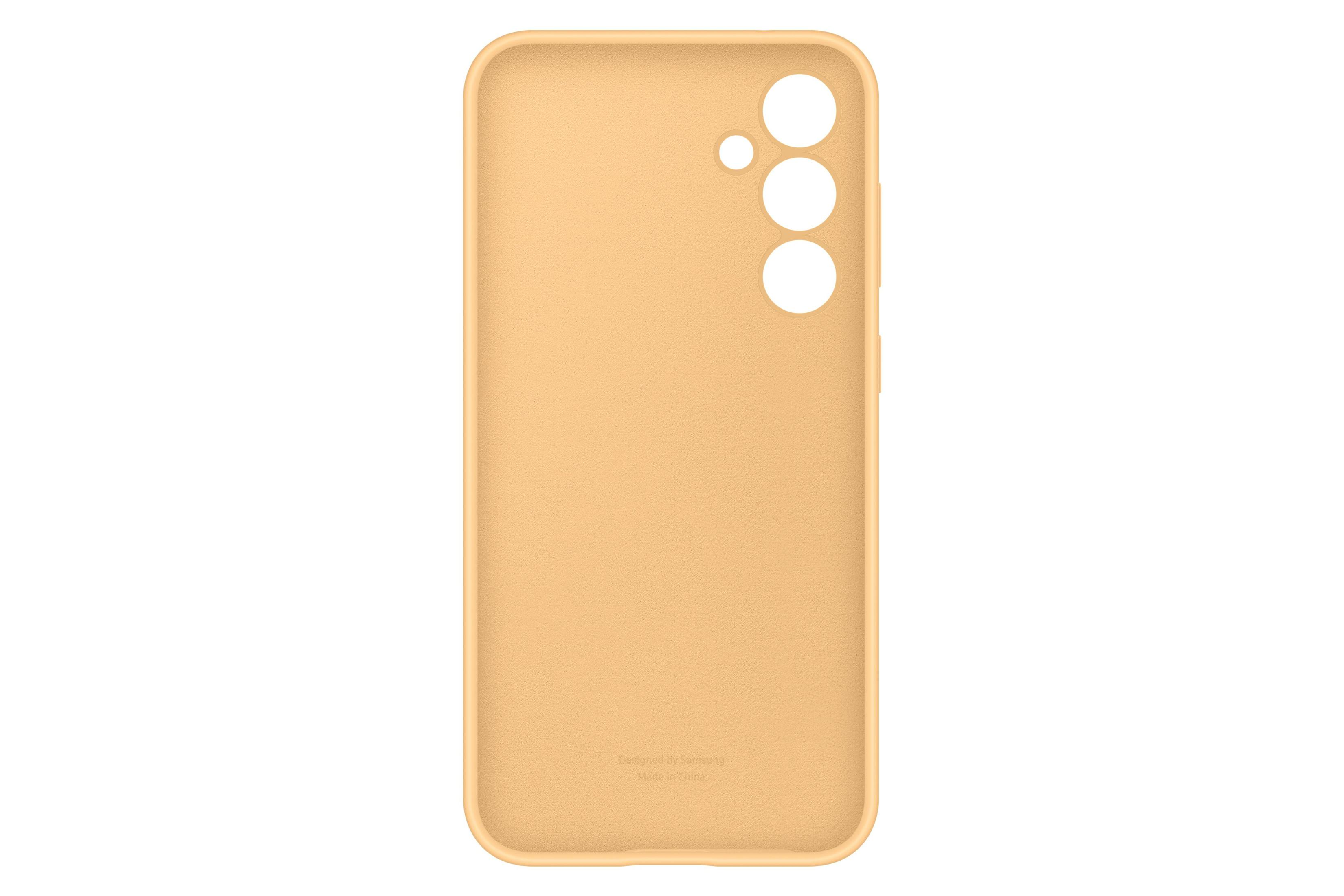 Funda amarilla para teléfono. La parte trasera de la funda está orientada hacia la cámara. Tiene tres agujeros.