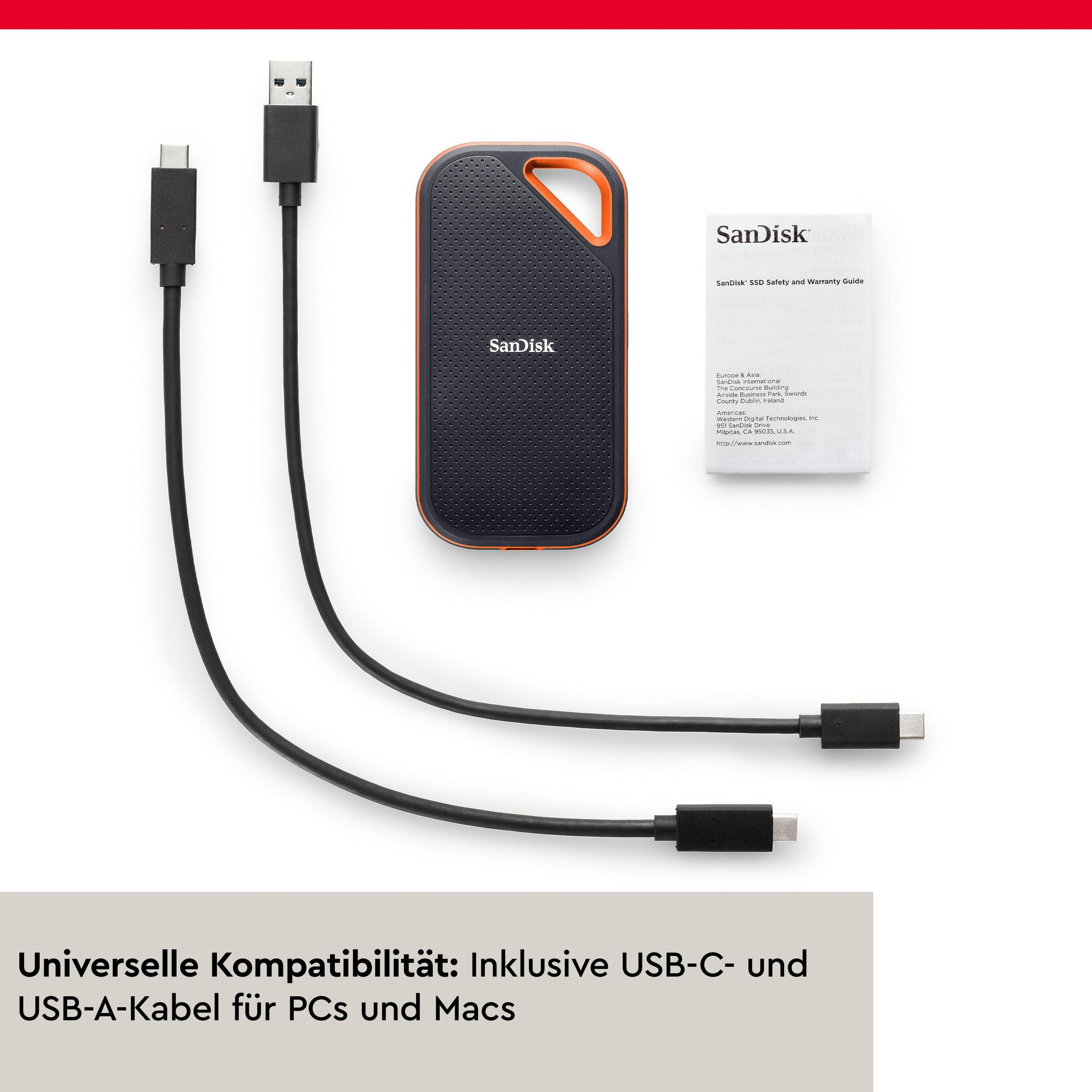 Zewnętrzny dysk twardy z kablami i instrukcją. Dysk jest czarny i pomarańczowy. Kable są czarne.