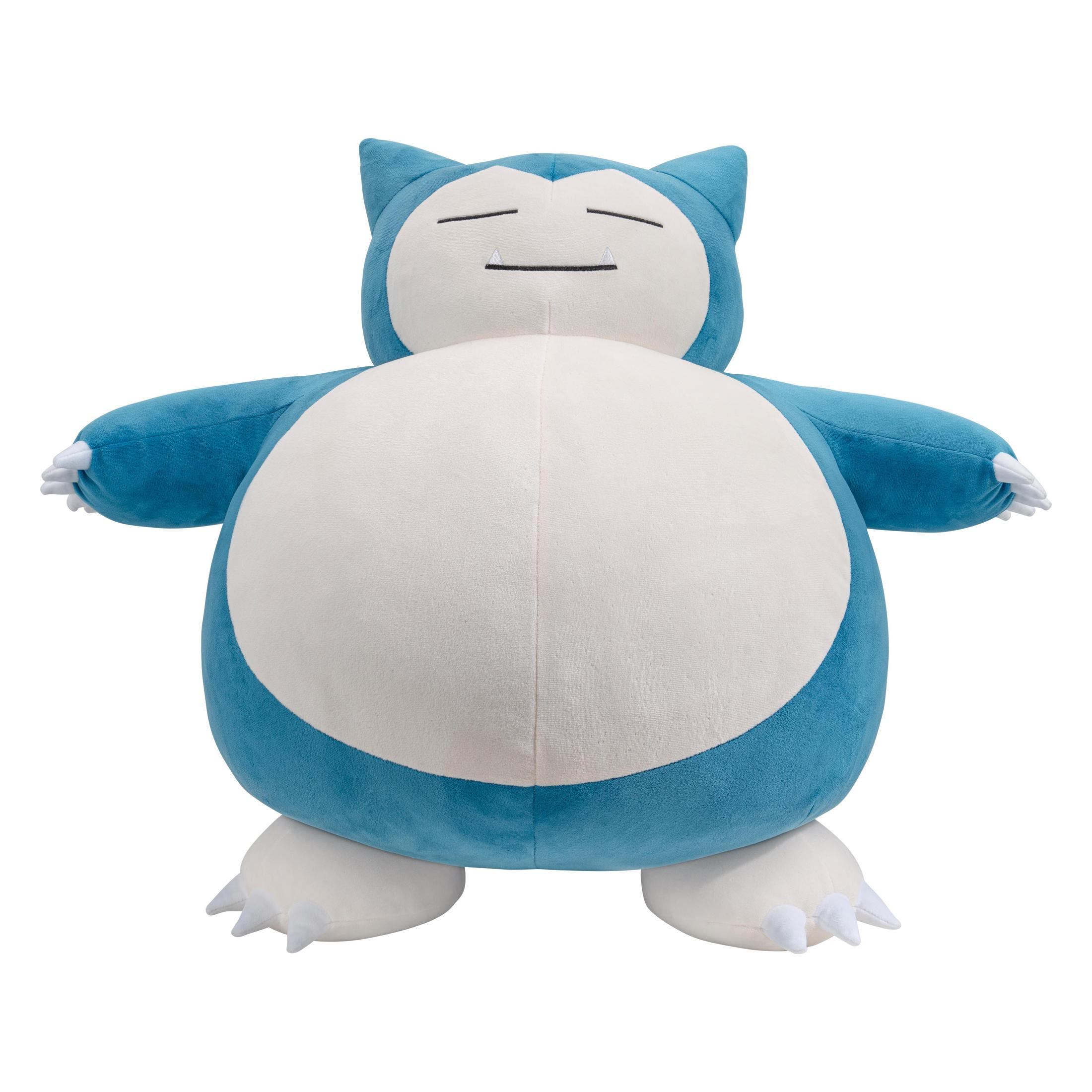Snorlax-Plüschtier. Blau und weiß, mit ausgestreckten Armen und geschlossenen Augen.