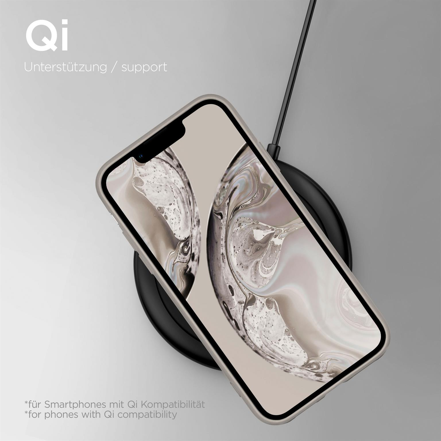 Ein Telefon in einem beigefarbenen Gehäuse auf einem kabellosen Ladegerät. Das Telefon ist schwarz.