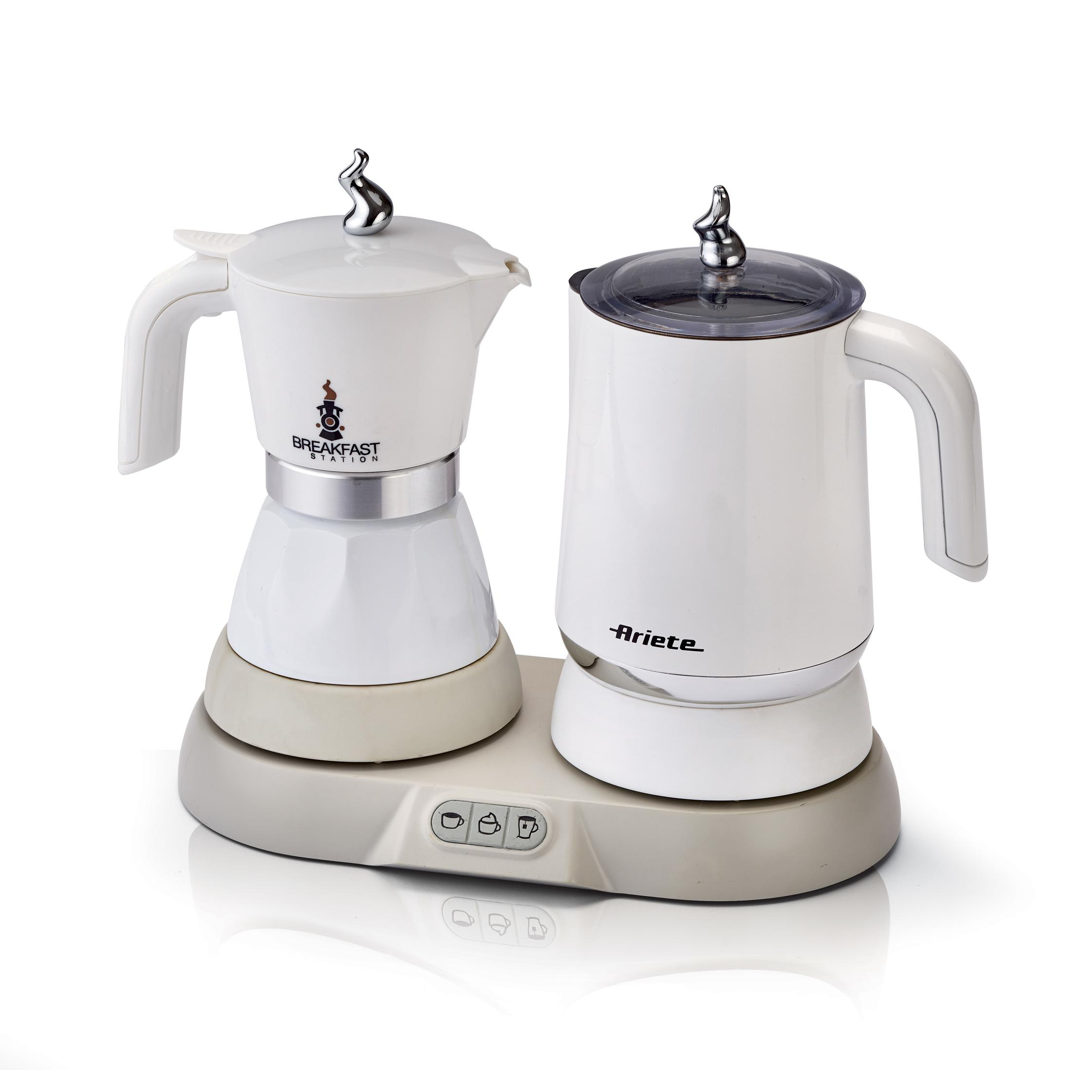 Dwa białe ekspresy do kawy na szarej podstawie. Jeden to ekspres do espresso, drugi to podgrzewacz.