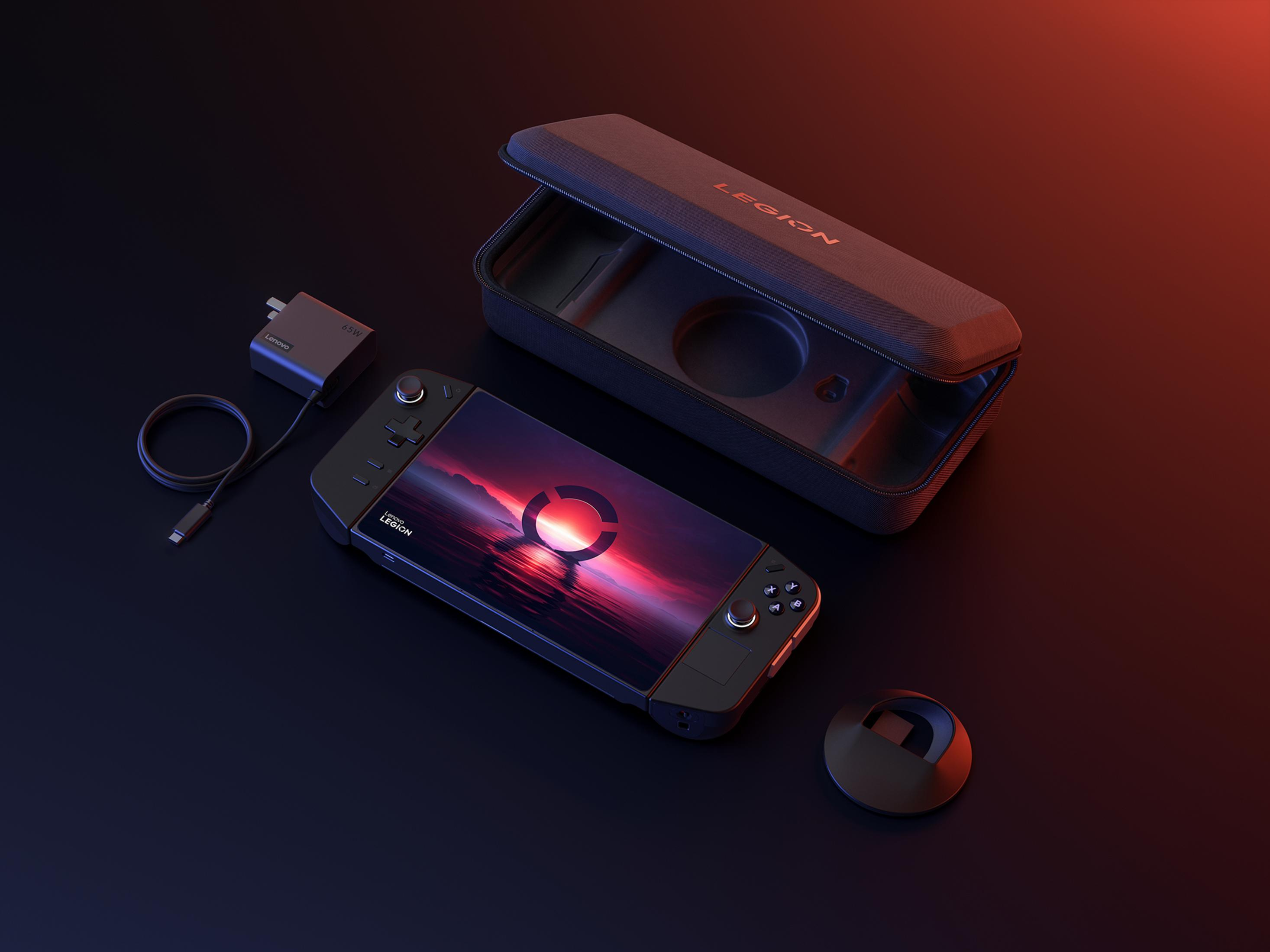 Un dispositivo di gioco portatile Lenovo Legion e accessori su una superficie scura, illuminazione rossa e nera.