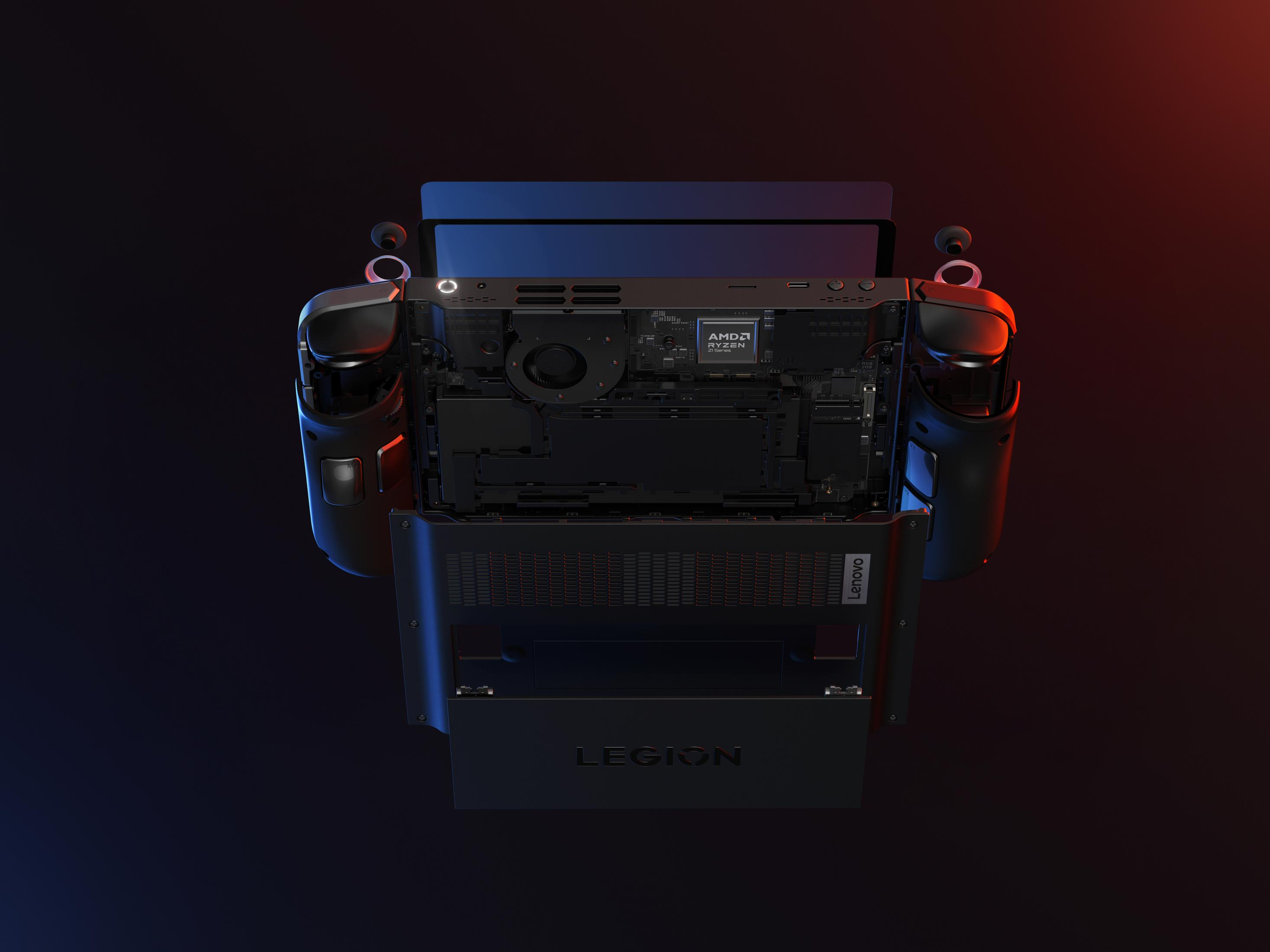 Laptop da gioco smontato, che mostra i componenti interni. Controller collegati ai lati.