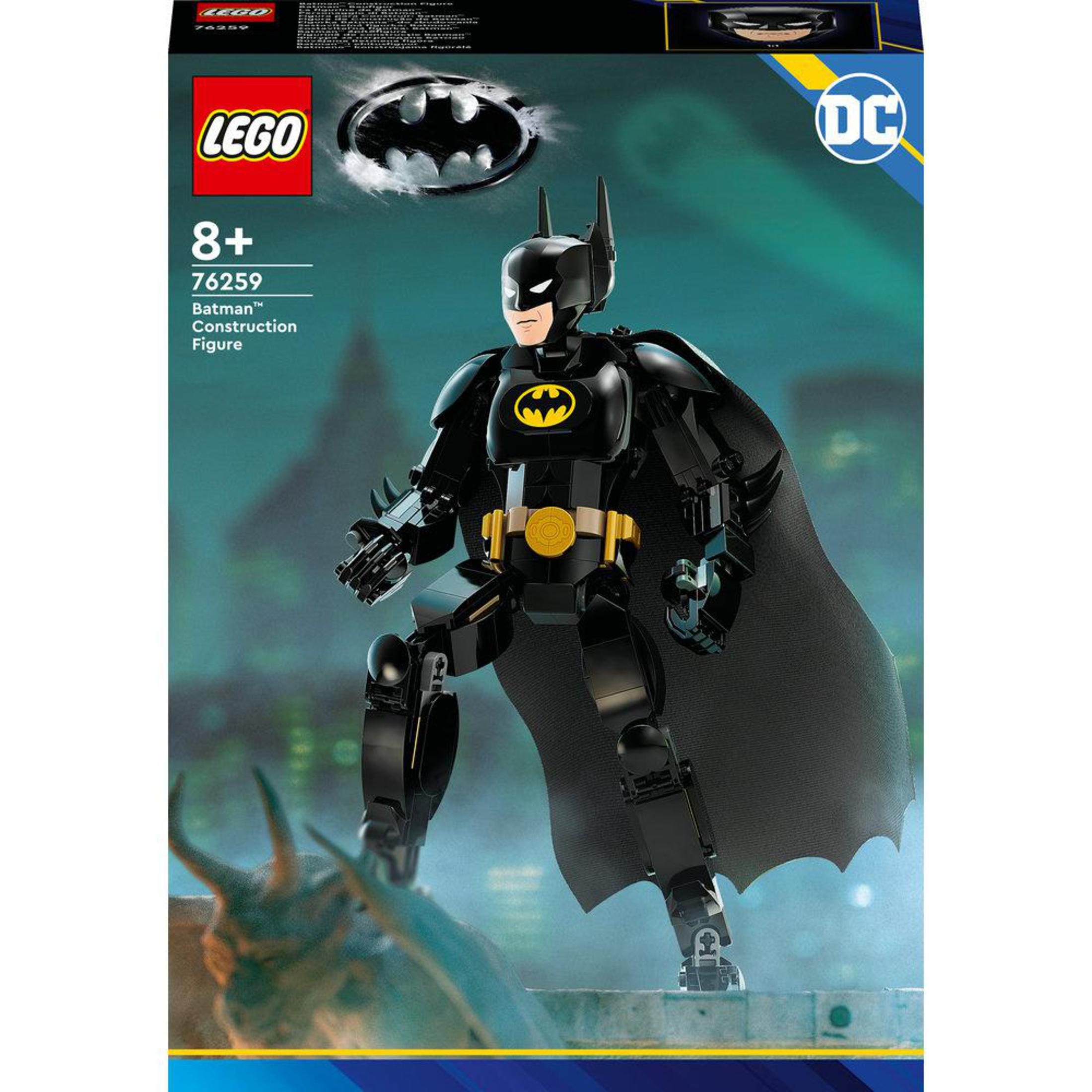 Figura de Lego Batman. Negro con detalles amarillos, capa y logo de Batman. Caja en el fondo.