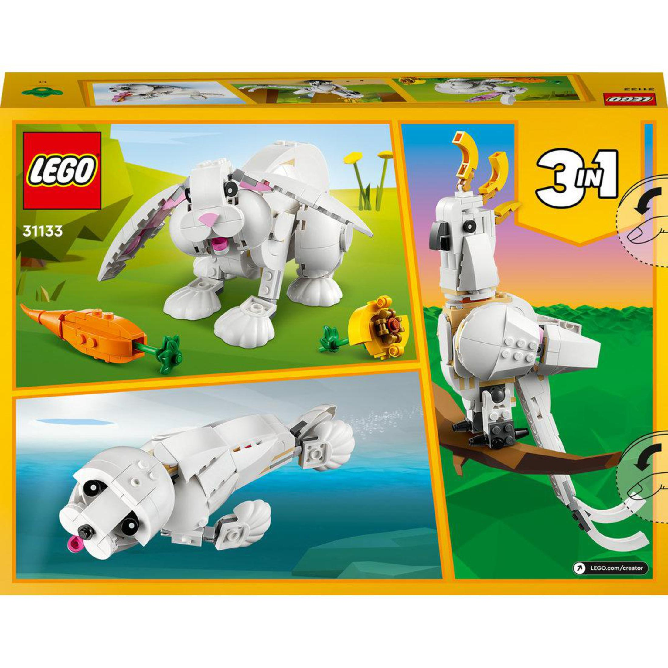 Lego-Box-Set mit weißen Kaninchen-, Papageien- und Hundemodellen. Karotte und gelbe Blume vorhanden.