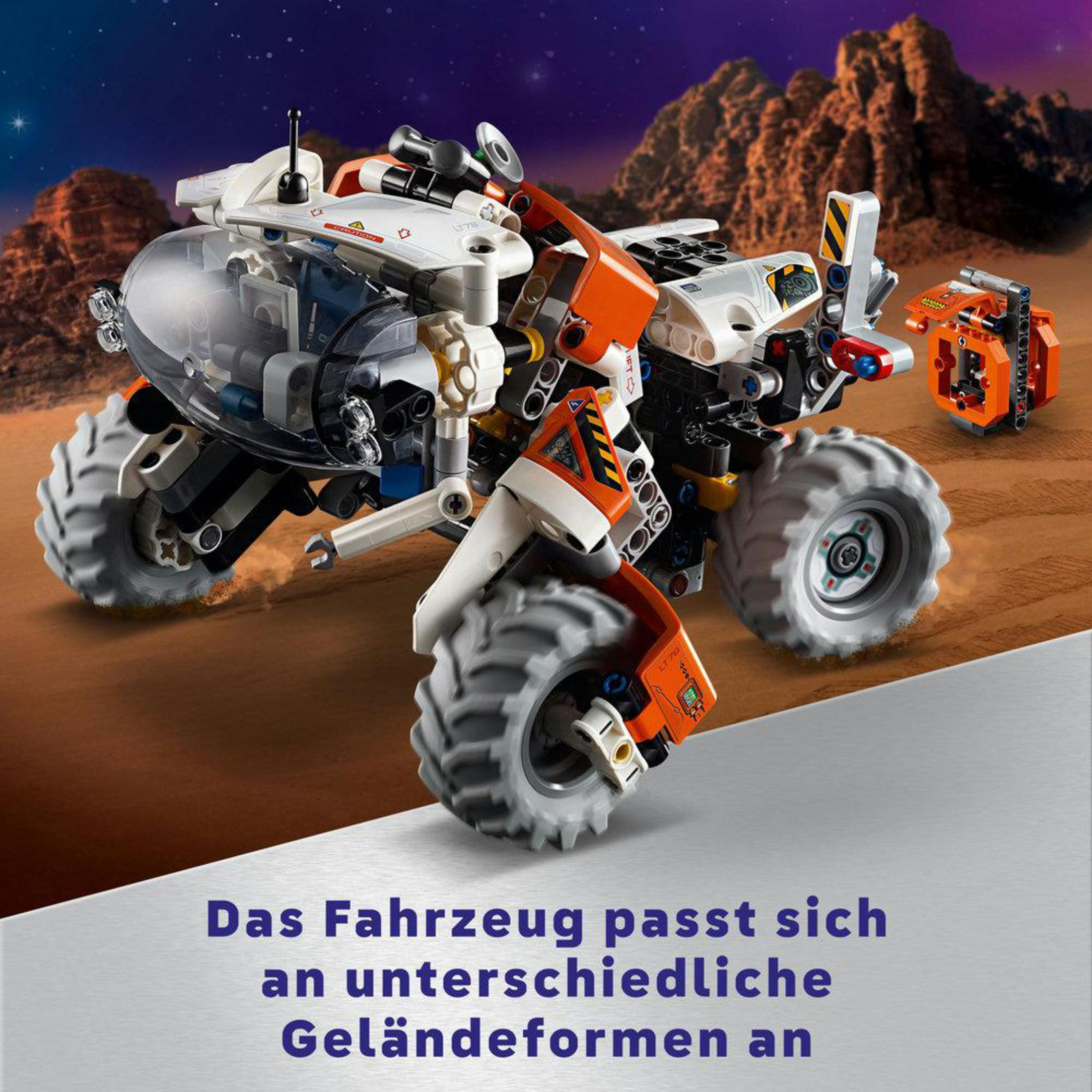 Buggy Lego Technic en terreno rocoso, con ruedas y detalles naranjas.