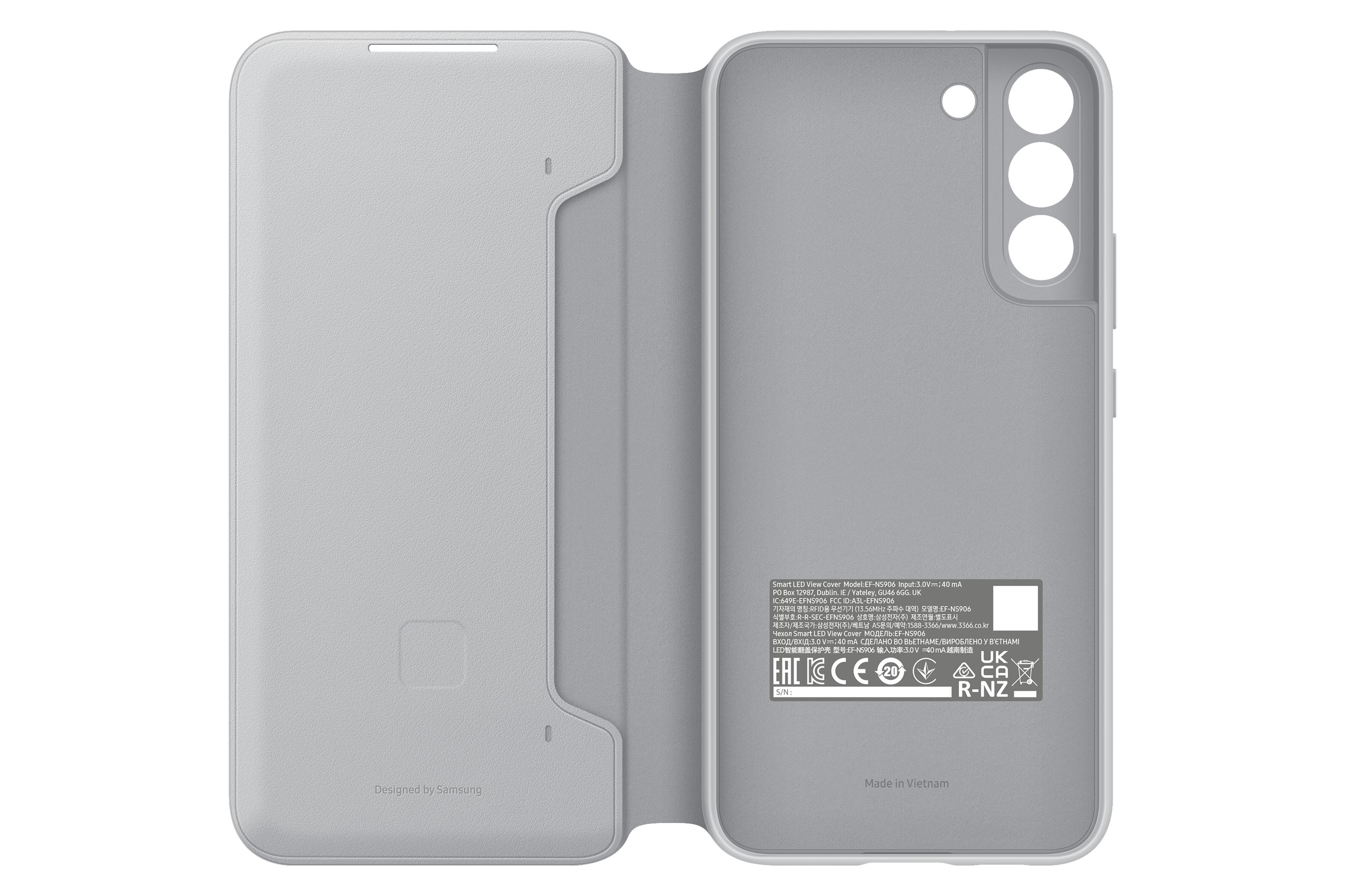 Una funda de teléfono gris claro, abierta, con el interior de la funda visible. Fondo blanco.