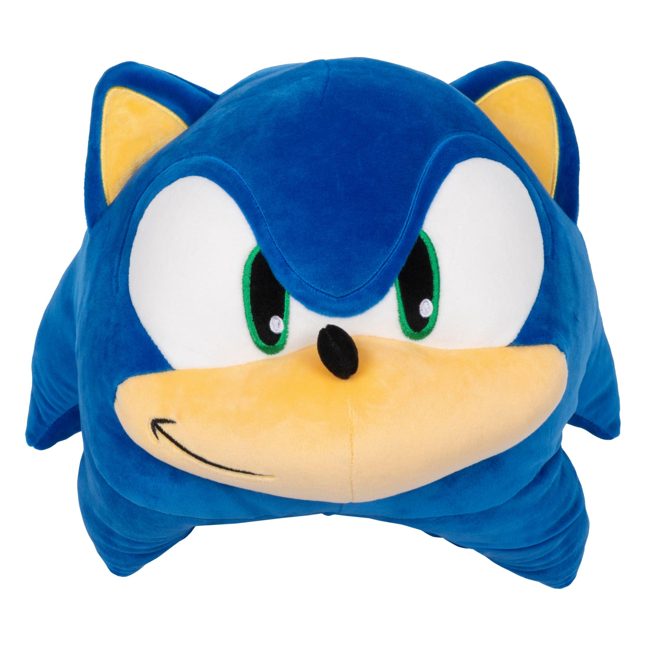 Un grande peluche blu di Sonic the Hedgehog. Ha un volto sorridente e orecchie gialle.