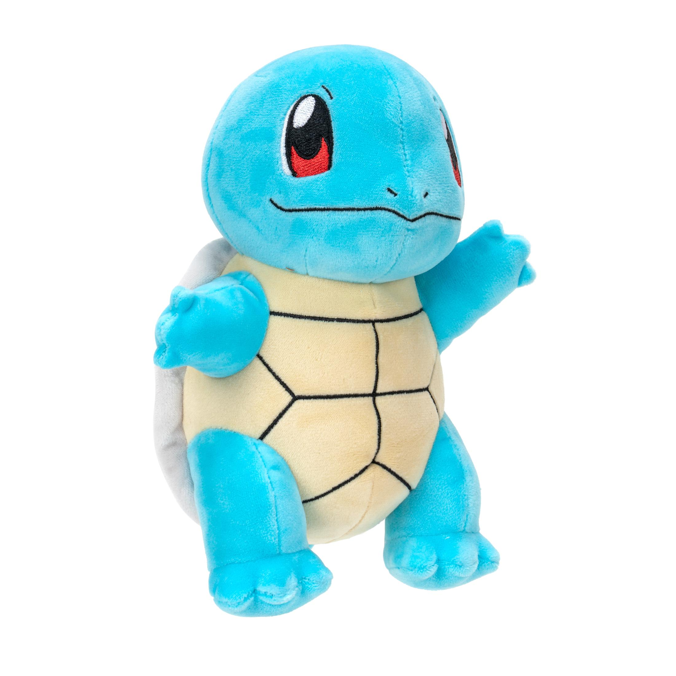 Blaues Squirtle-Plüschtier steht mit erhobenen Armen und offenem Mund.