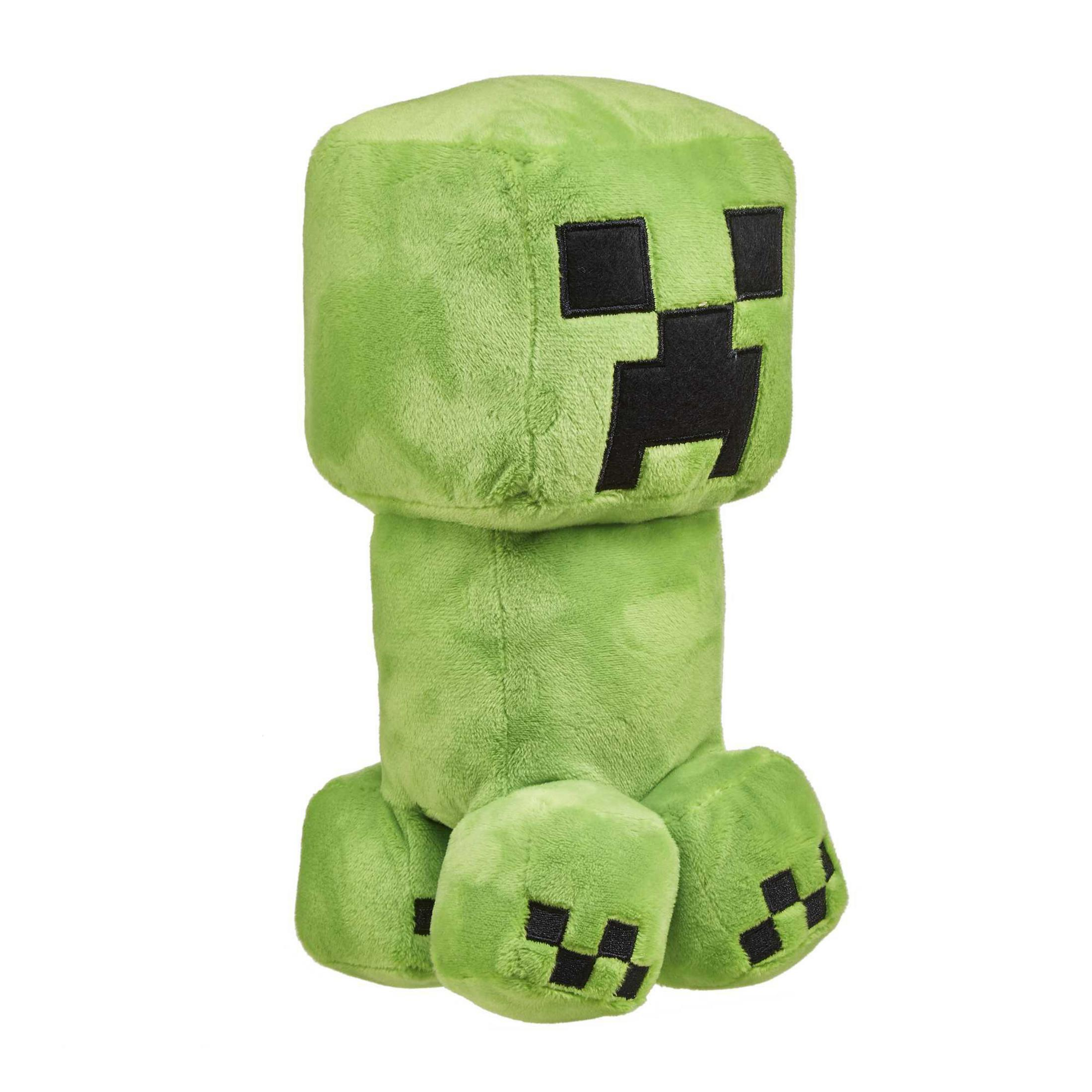 Ein grünes Minecraft Creeper-Plüschtier, aufrecht stehend auf weißem Hintergrund.