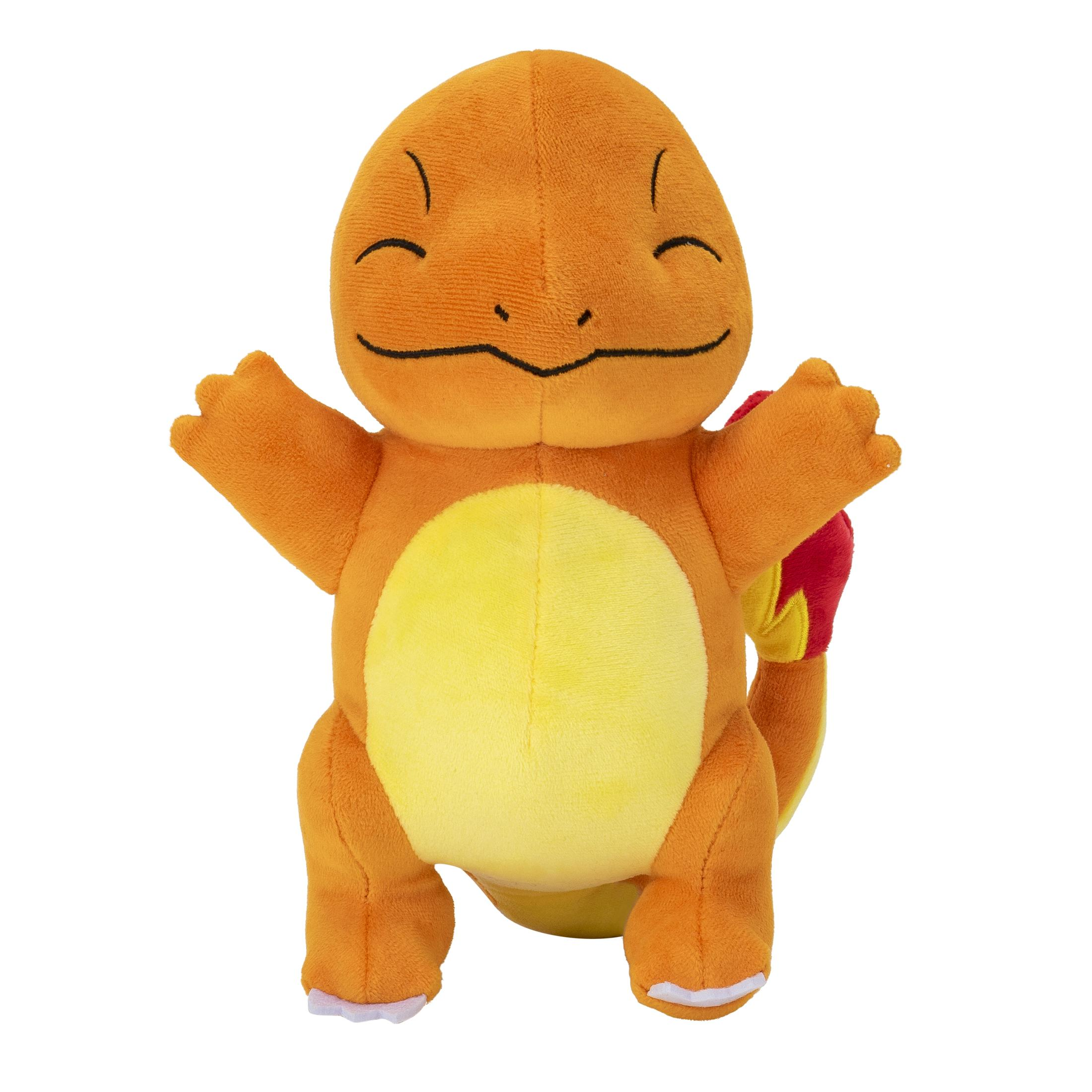 Ein orangefarbenes Charmander-Plüschtier mit ausgebreiteten Armen und geschlossenen Augen.