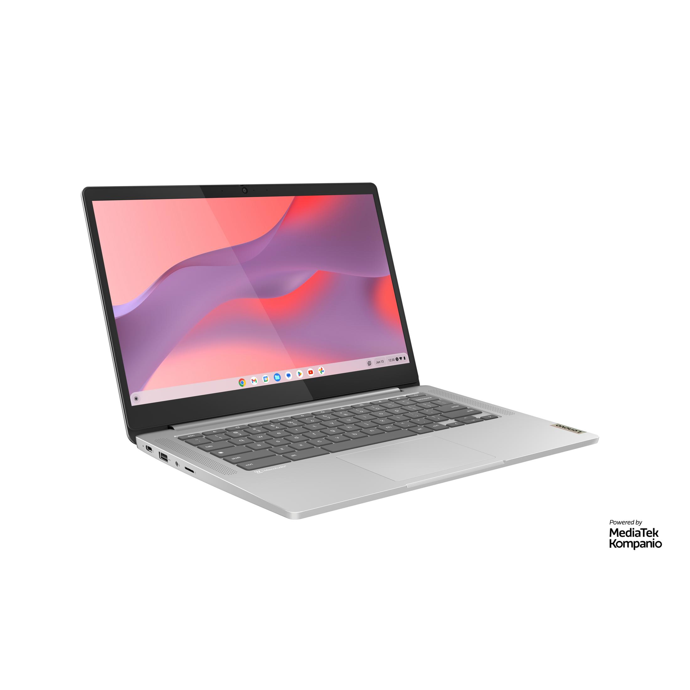 Silberner Laptop auf einem Tisch. Zeigt einen rosa-lila Hintergrund mit einem Chrome-Logo.