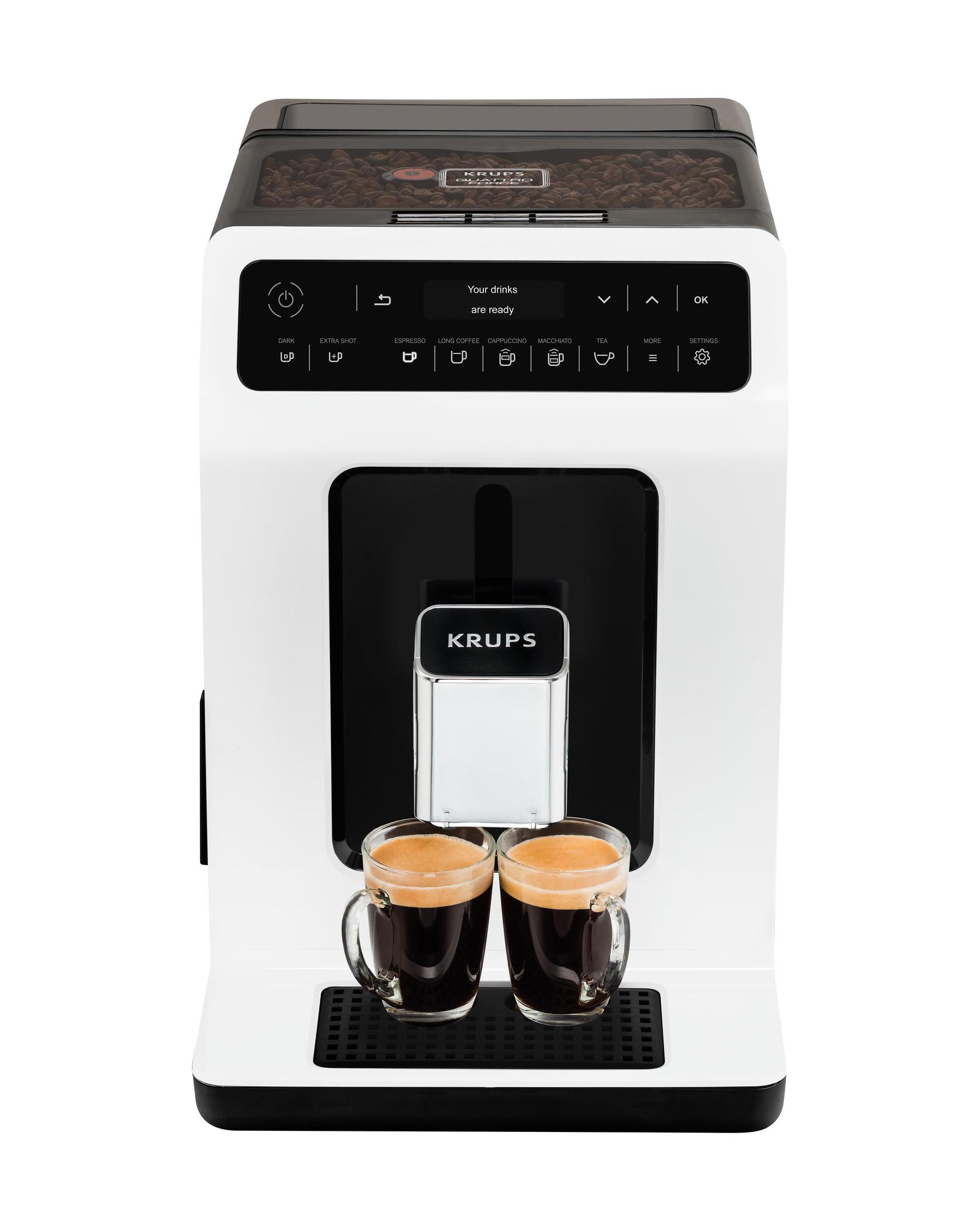 Una macchina da caffè bianca e nera con due tazze di caffè espresso. Lo schermo dice, le tue bevande sono pronte.